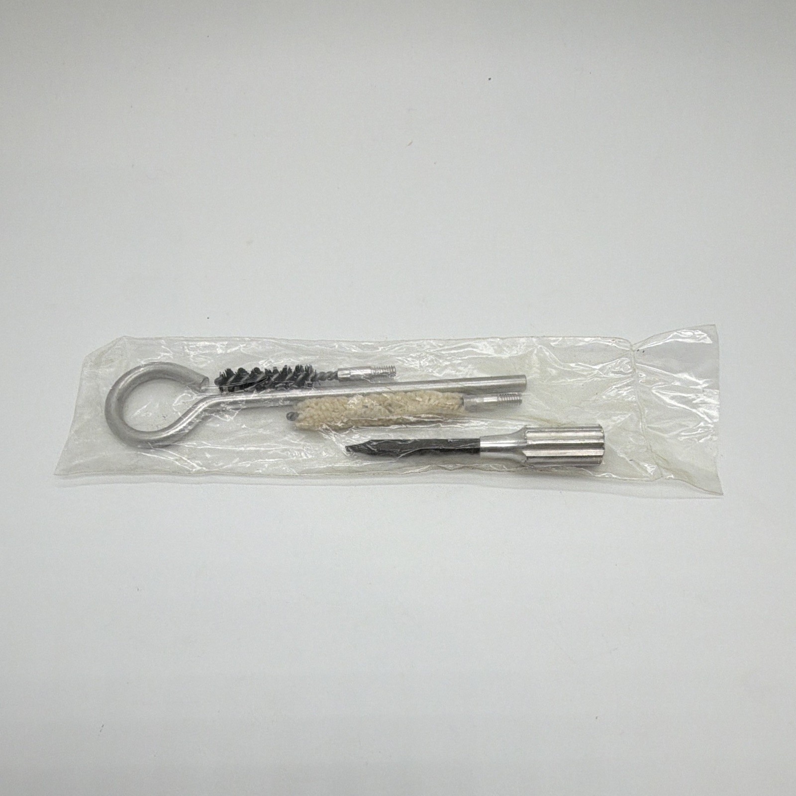 Vintage Smith & Wesson 4 piece 5 inch cleaning kit with screwdriver New Factory Vintage Smith & Wesson 4 piece 5 inch cleaning kit with screwdriver New Factory