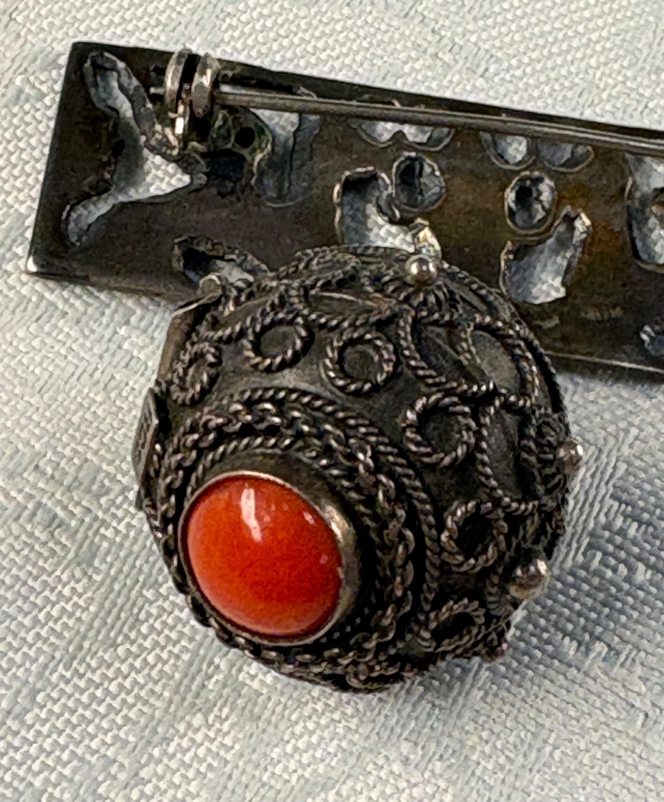ANTIQUE STERLING SILVER FIGURIAL BAR BROOCH WITH CORAL STONE PILL BOX