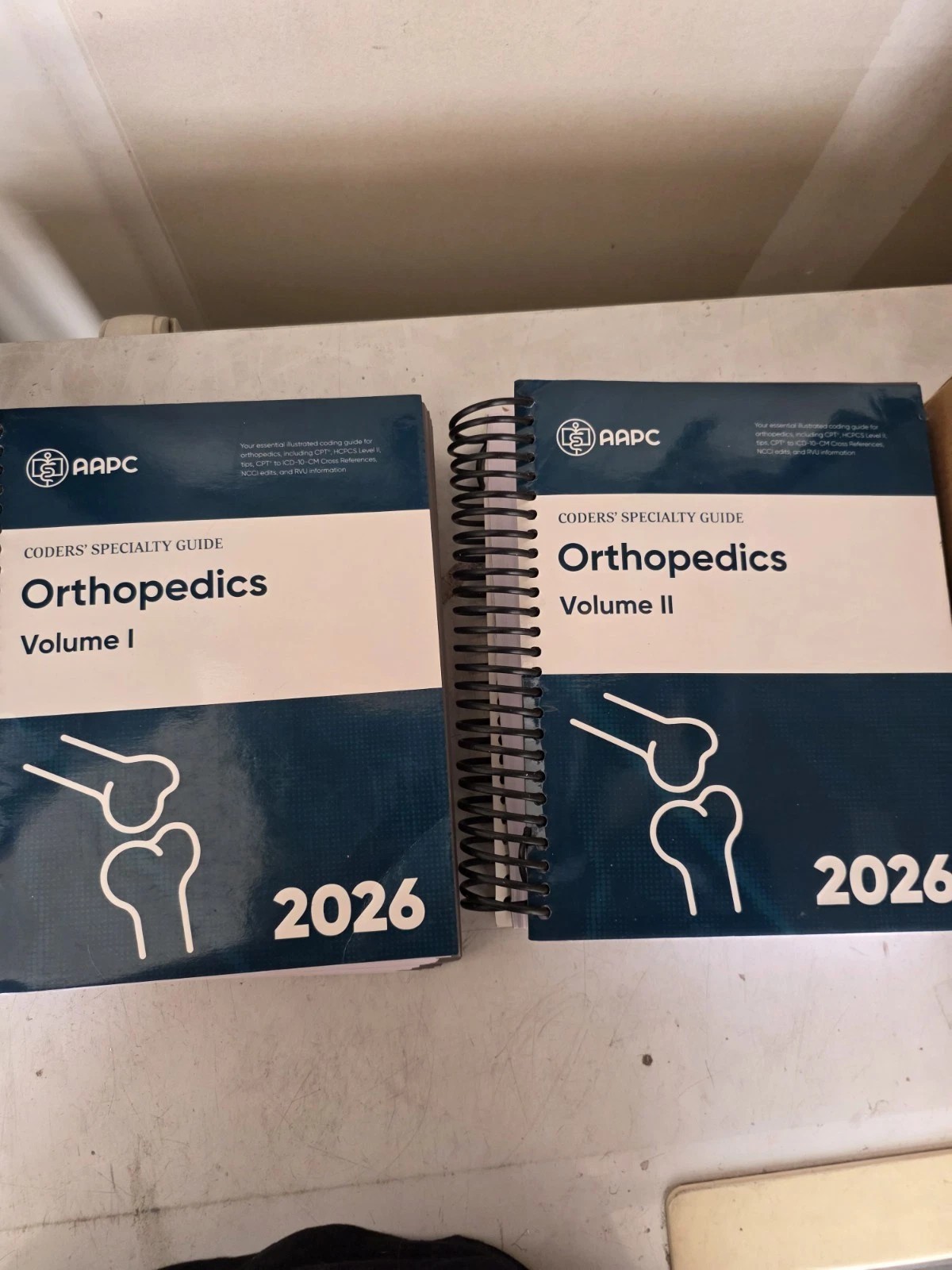 AAPC 2026 Coders\' Specialty Guide Orthopedics Volumes I & II Set, AAPC 2026 Coders\' Specialty Guide Orthopedics Volumes I & II Set,