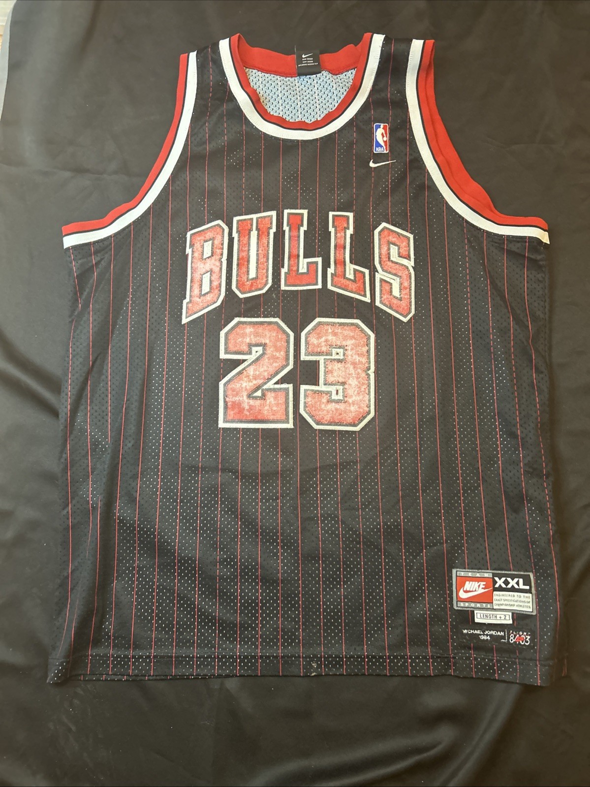 1994 Vintage Nike NBA Michael Jordan Chicago Bulls #23 Pinstripe Jersey-XXL 1994 Vintage Nike NBA Michael Jordan Chicago Bulls #23 Pinstripe Jersey-XXL