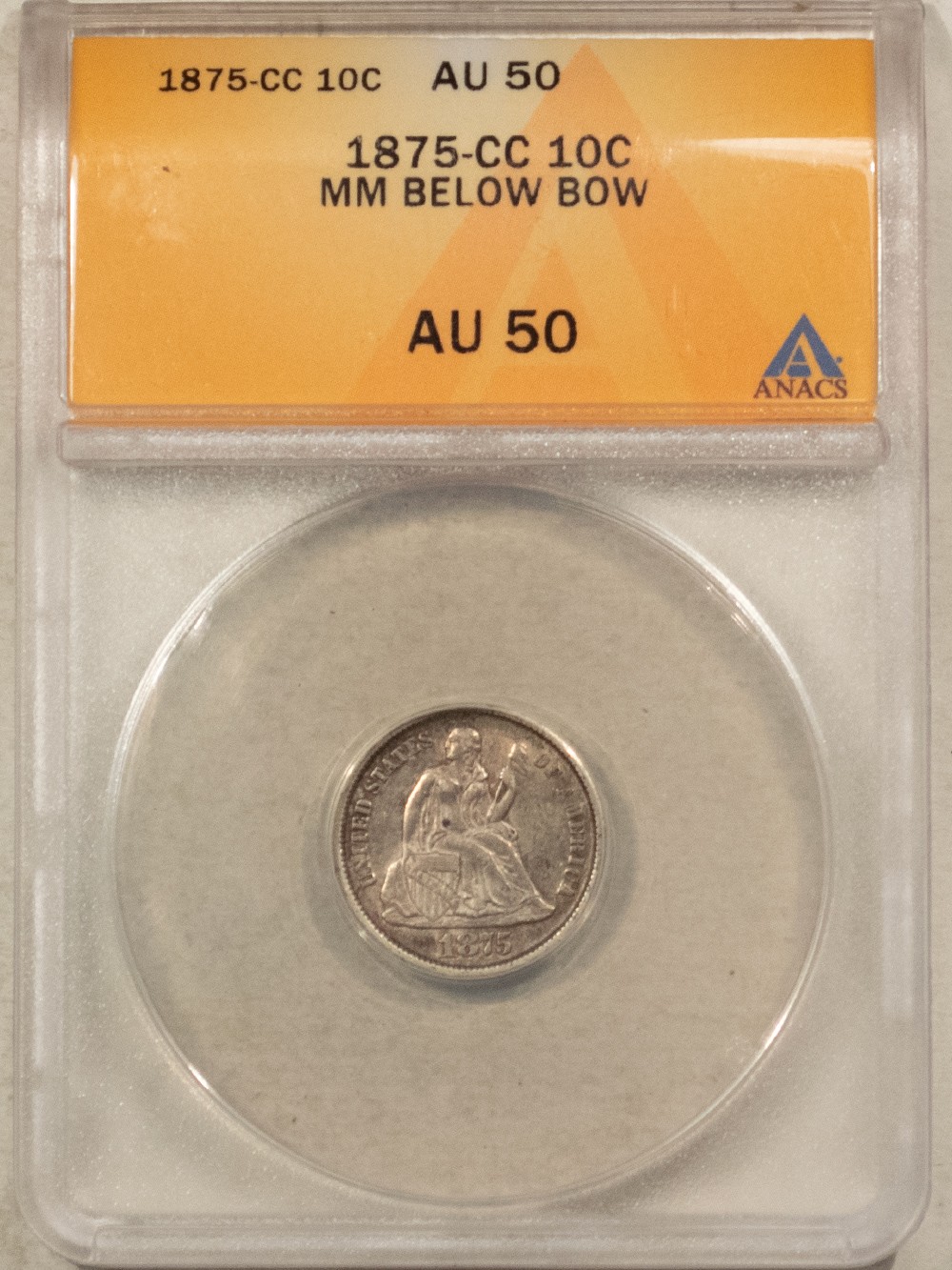 1875-CC SEATED LIBERTY DIME, MINTMARK BELOW BOW - ANACS AU-50, CARSON CITY