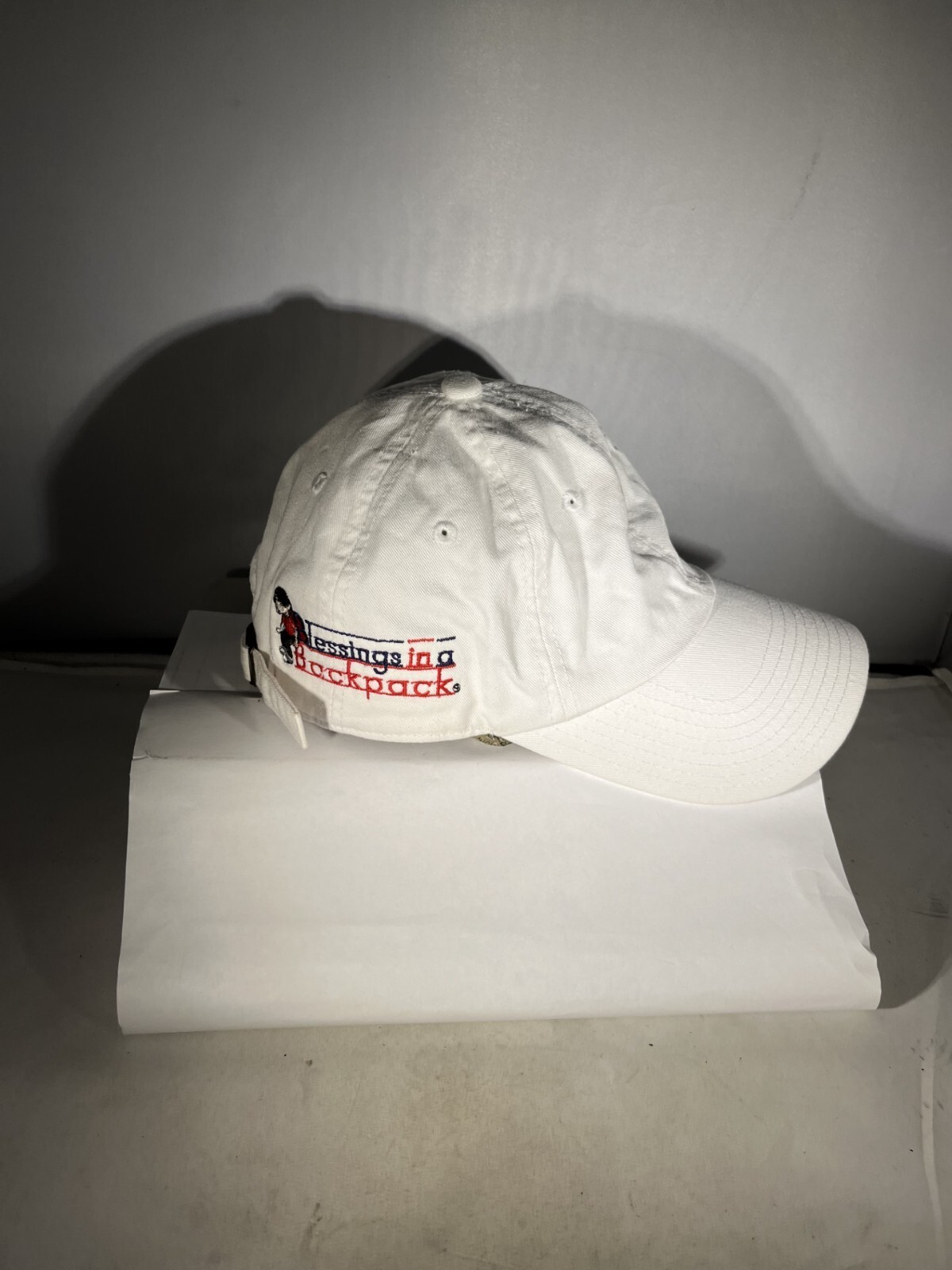 Blessing in a backpack white baseball cap by American Needle     AQ24