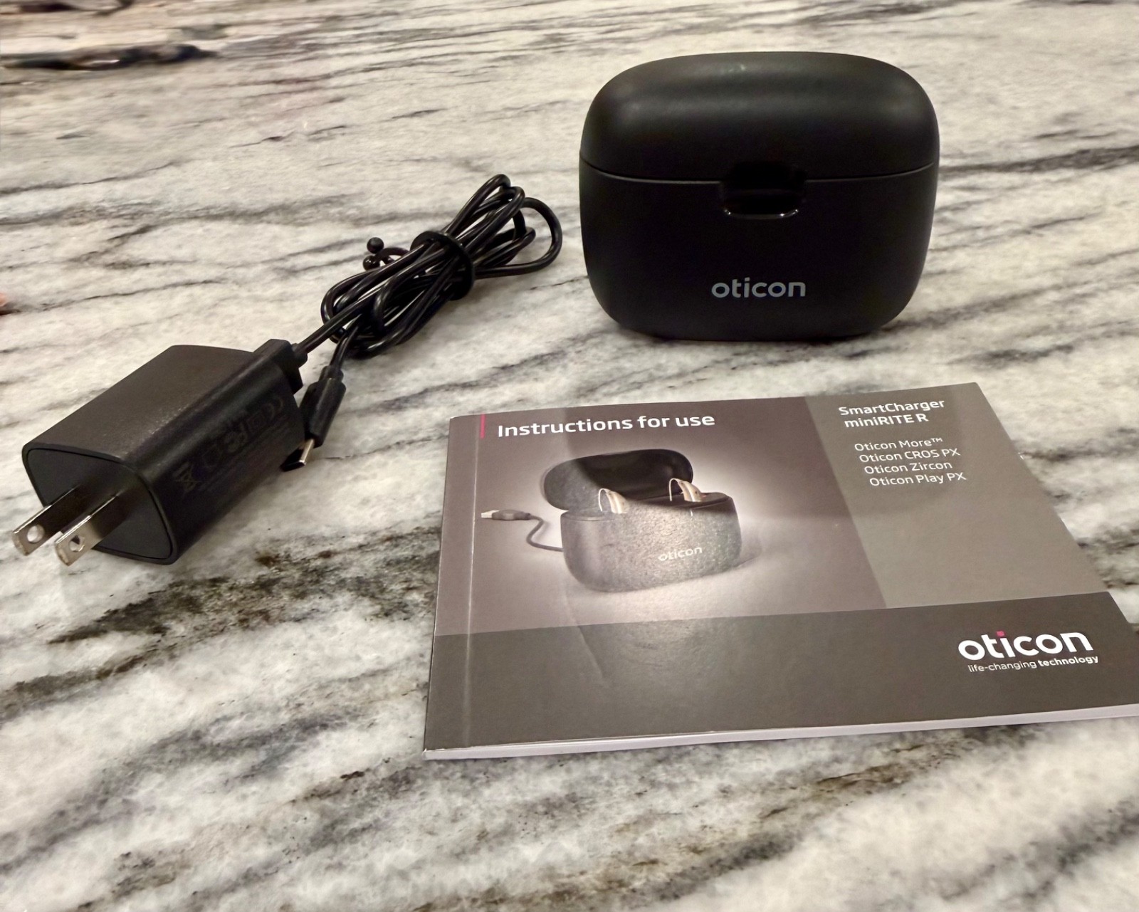 Oticon SmartCharger miniRITE R C-2A Hearing Aid Charger w/Instruction Booklet Oticon SmartCharger miniRITE R C-2A Hearing Aid Charger w/Instruction Booklet