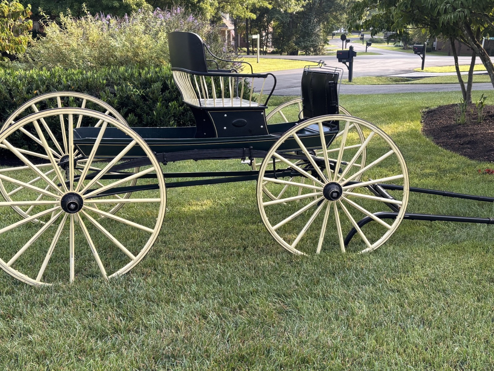 Restored antique Spindle-Back Runabout, horse-drawn carriage, buggy, buckboard.