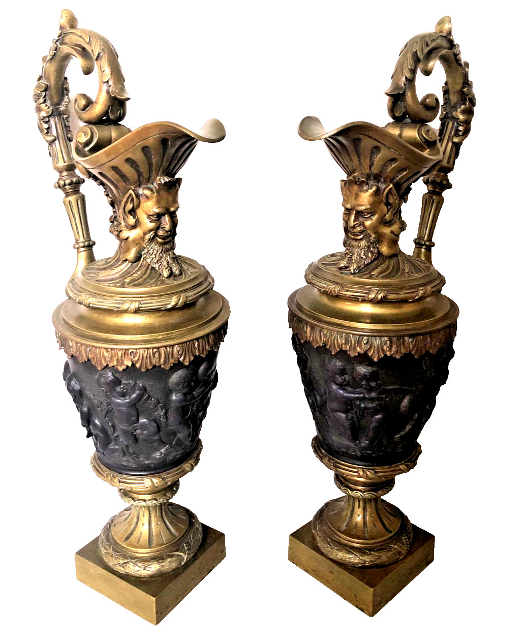 Pair of Antique French Renaissance Revival Large Patinated Bronze Ewers. Pair of Antique French Renaissance Revival Large Patinated Bronze Ewers.