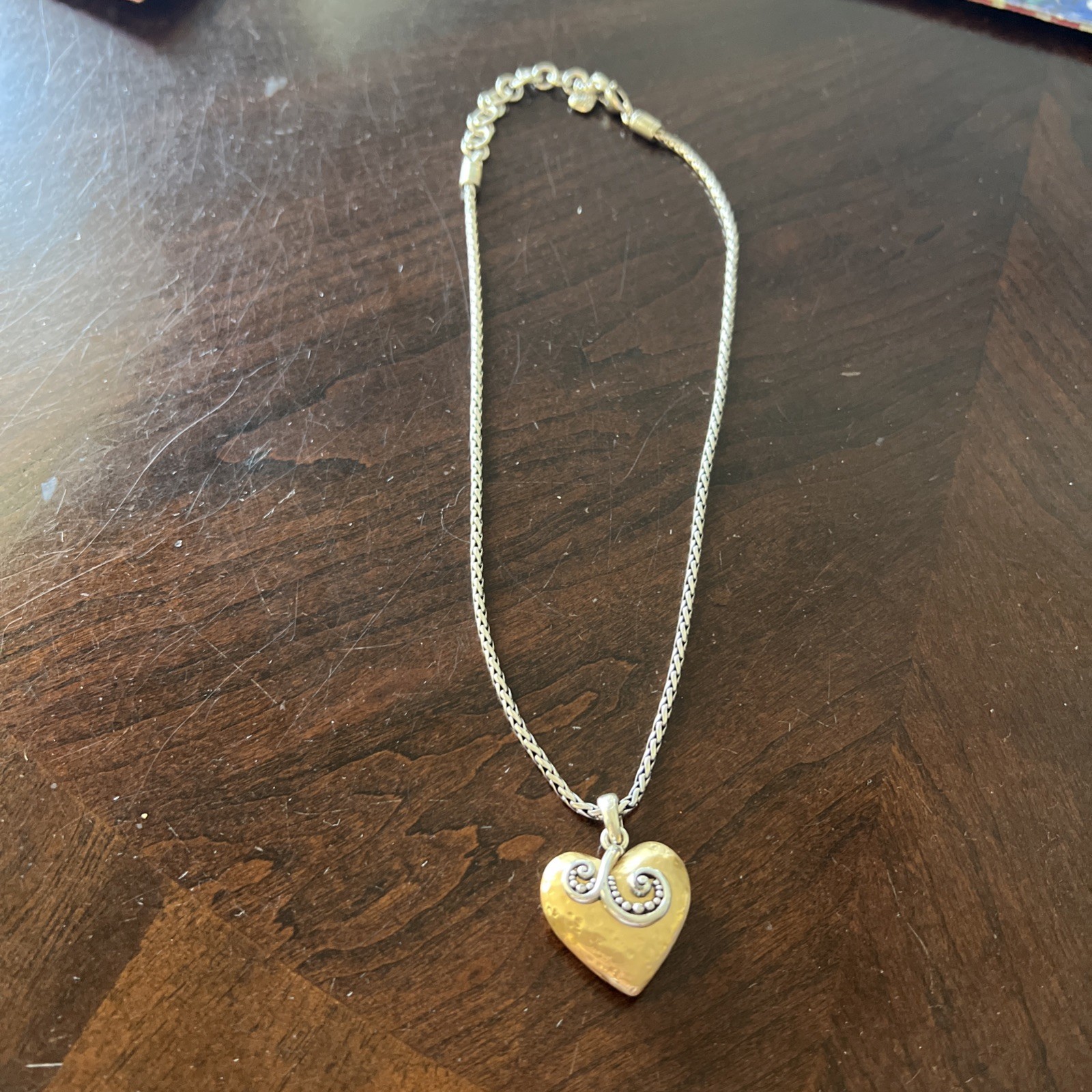 Retired Brighton Spellbound Goldtone puffy heart silver Tone necklace with pou
