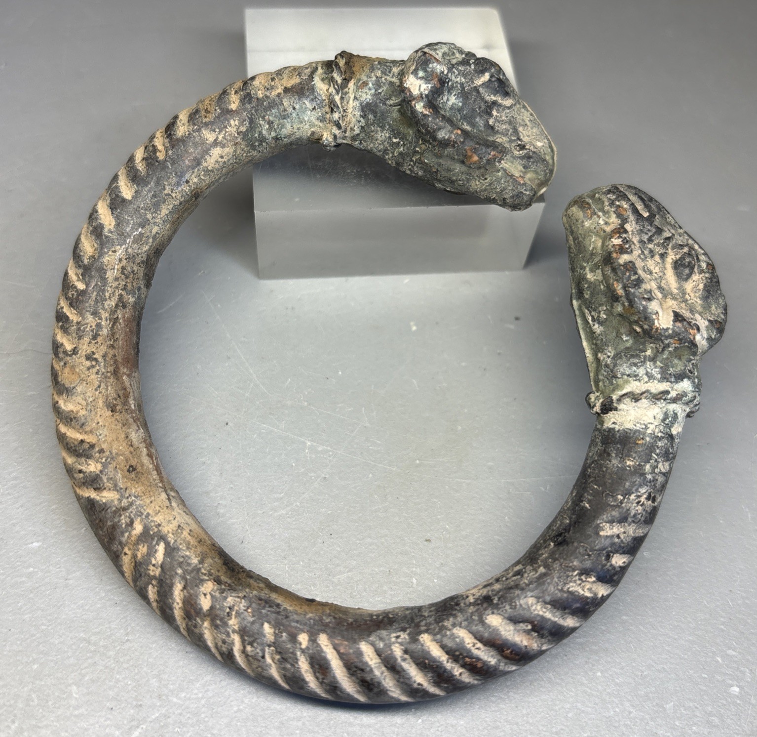 Ancient parthian bronze bracelet with zoomorphic terminals