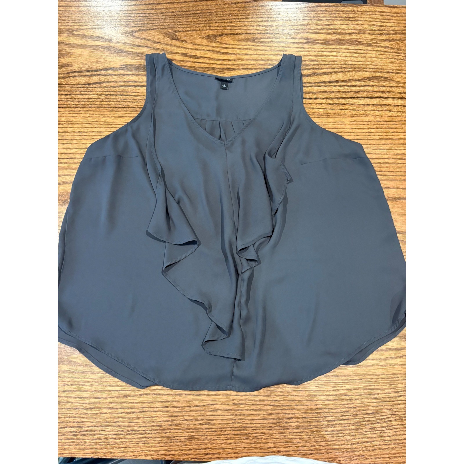 Torrid Grey Ruffle Front V-Neck Sleeveless Georgette Blouse Plus Size 2 2X Torrid Grey Ruffle Front V-Neck Sleeveless Georgette Blouse Plus Size 2 2X