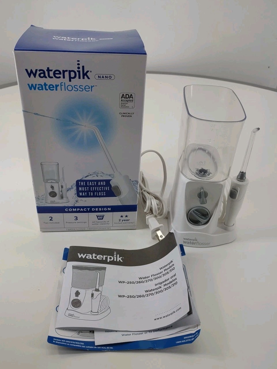 Waterpik Waterflosser Nano WP-310W Compact White 2 Tips 3 Pressure Settings New Waterpik Waterflosser Nano WP-310W Compact White 2 Tips 3 Pressure Settings New