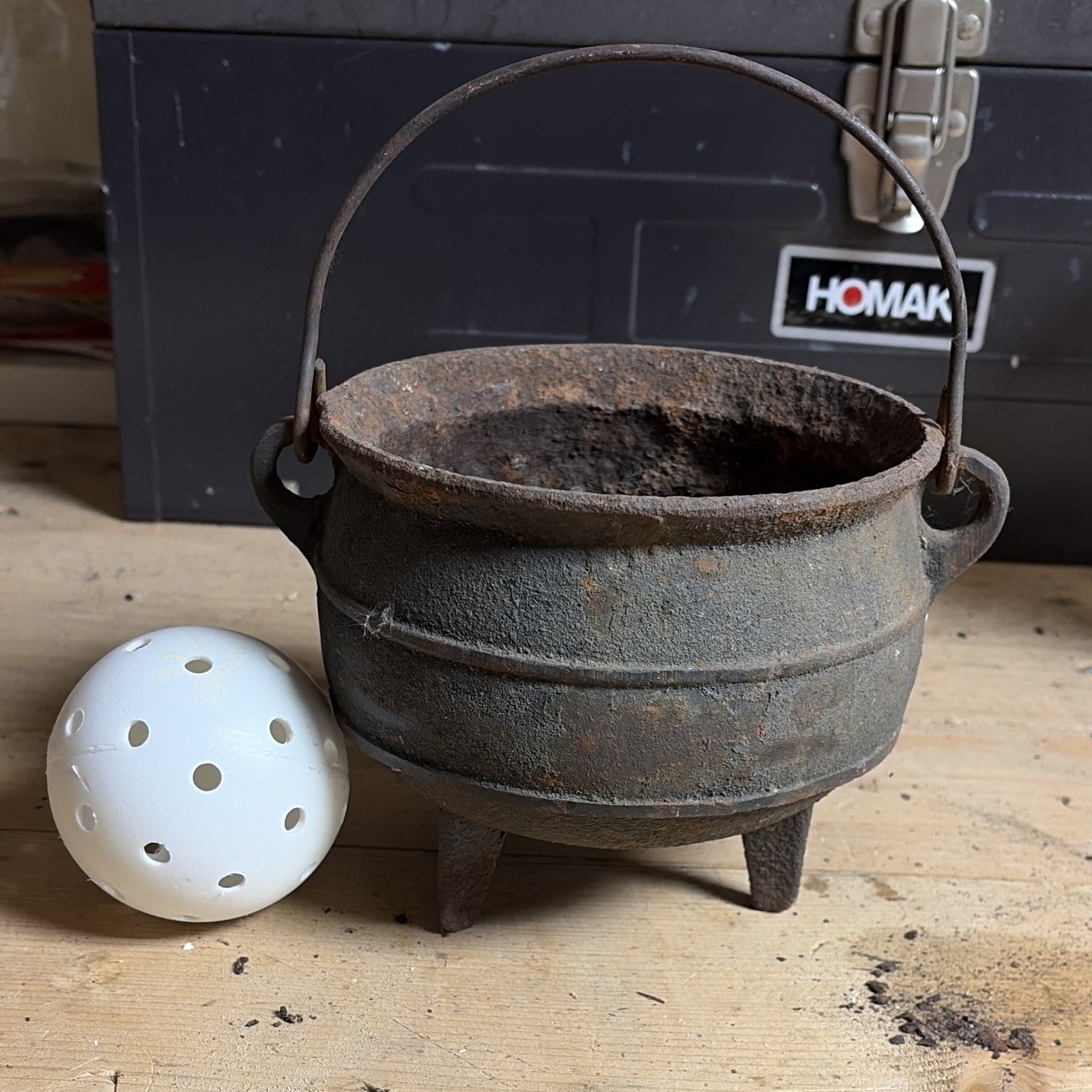 Vintage Cast Iron Pot Marked W. CO, Bail Handle, Three-Legged Tripod Vintage Cast Iron Pot Marked W. CO, Bail Handle, Three-Legged Tripod