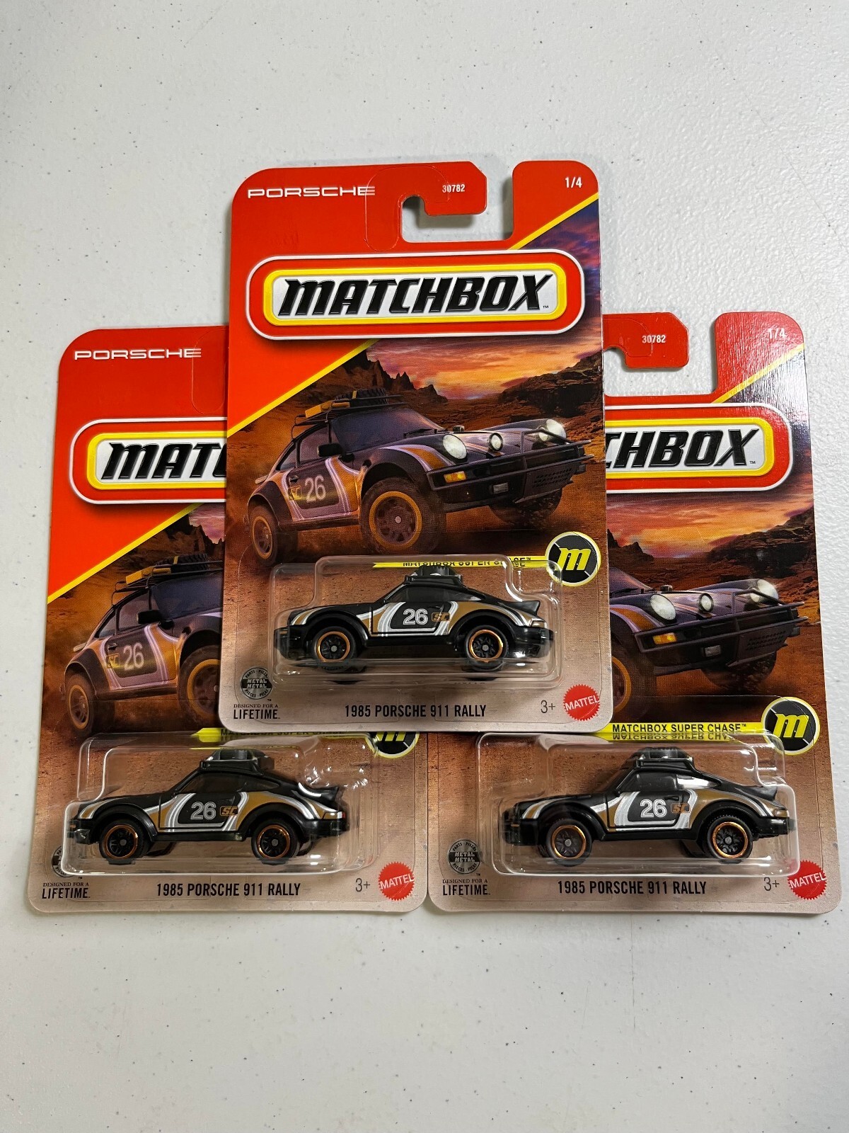 1985 Porsche 911 Rally Super Chase Matchbox 3 Pack 1:64 1985 Porsche 911 Rally Super Chase Matchbox 3 Pack 1:64