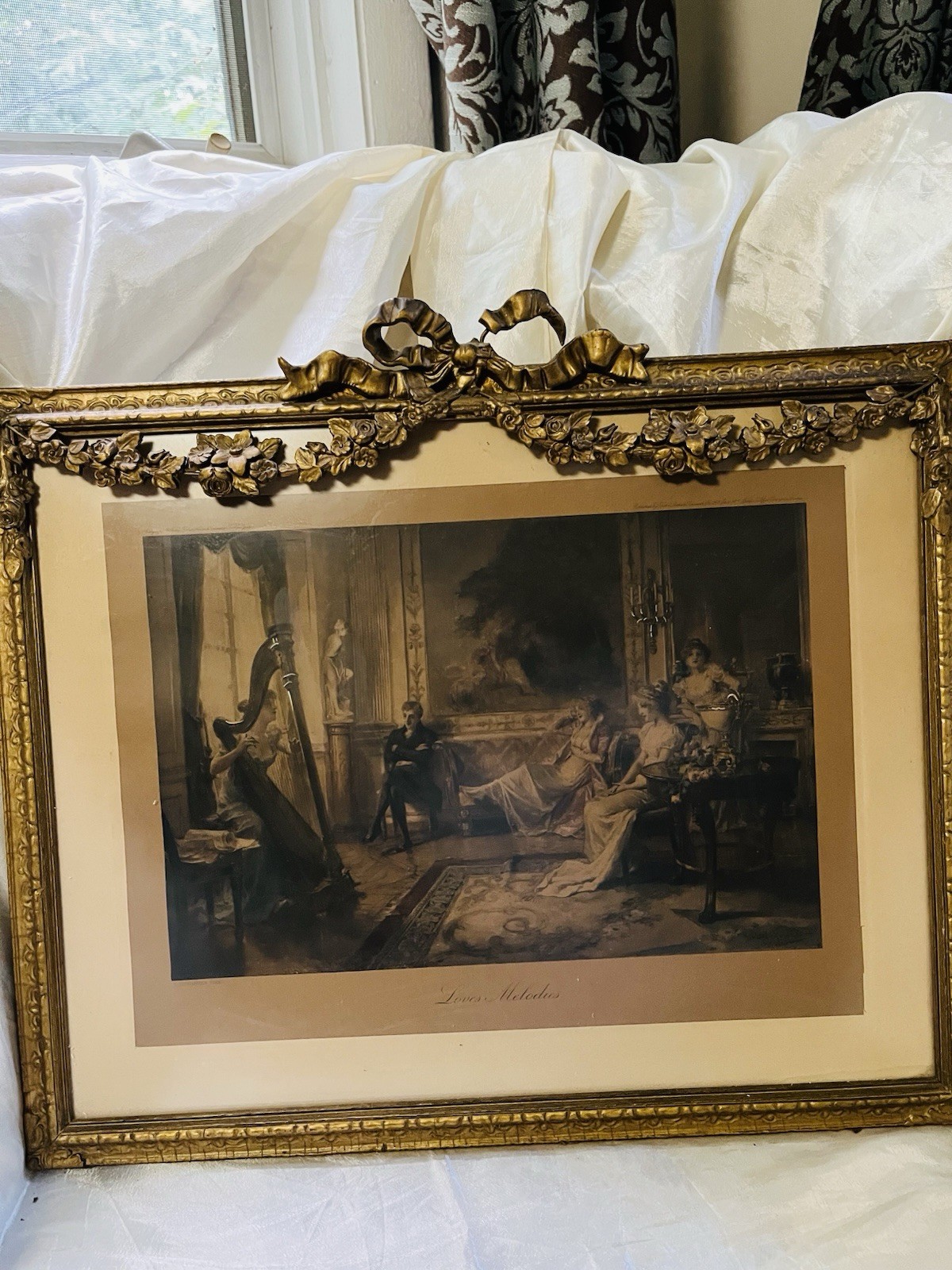 Antique Victorian Bow Floral  Frame With Lithograph Saying “ Loves Melodies”