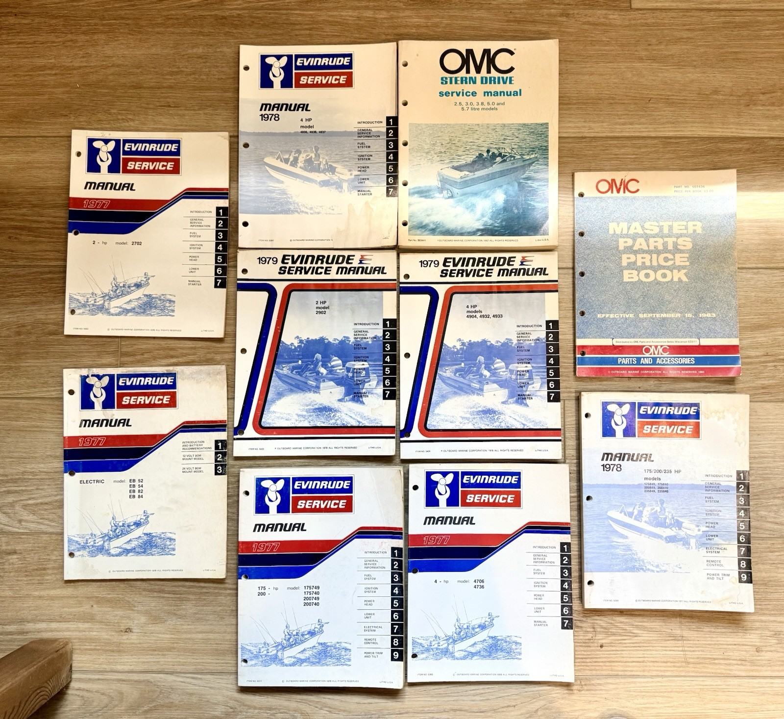 OMC Lot of 10 1977 - 1979 EVINRUDE SERVICE MANUALS & 1983 MASTER PART PRICE LIST