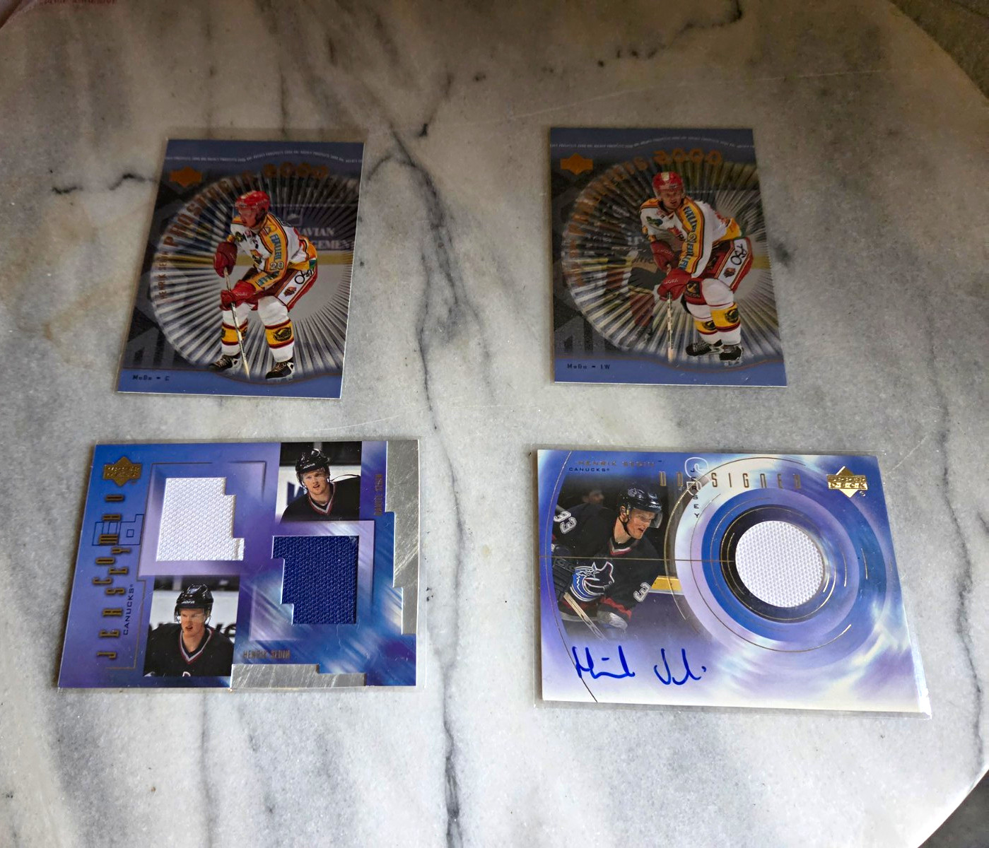 Henrik & Daniel Sedin HOF Jersey, Rc and Auto. UD 00-03.  4 Card Lot Patchs,Auto