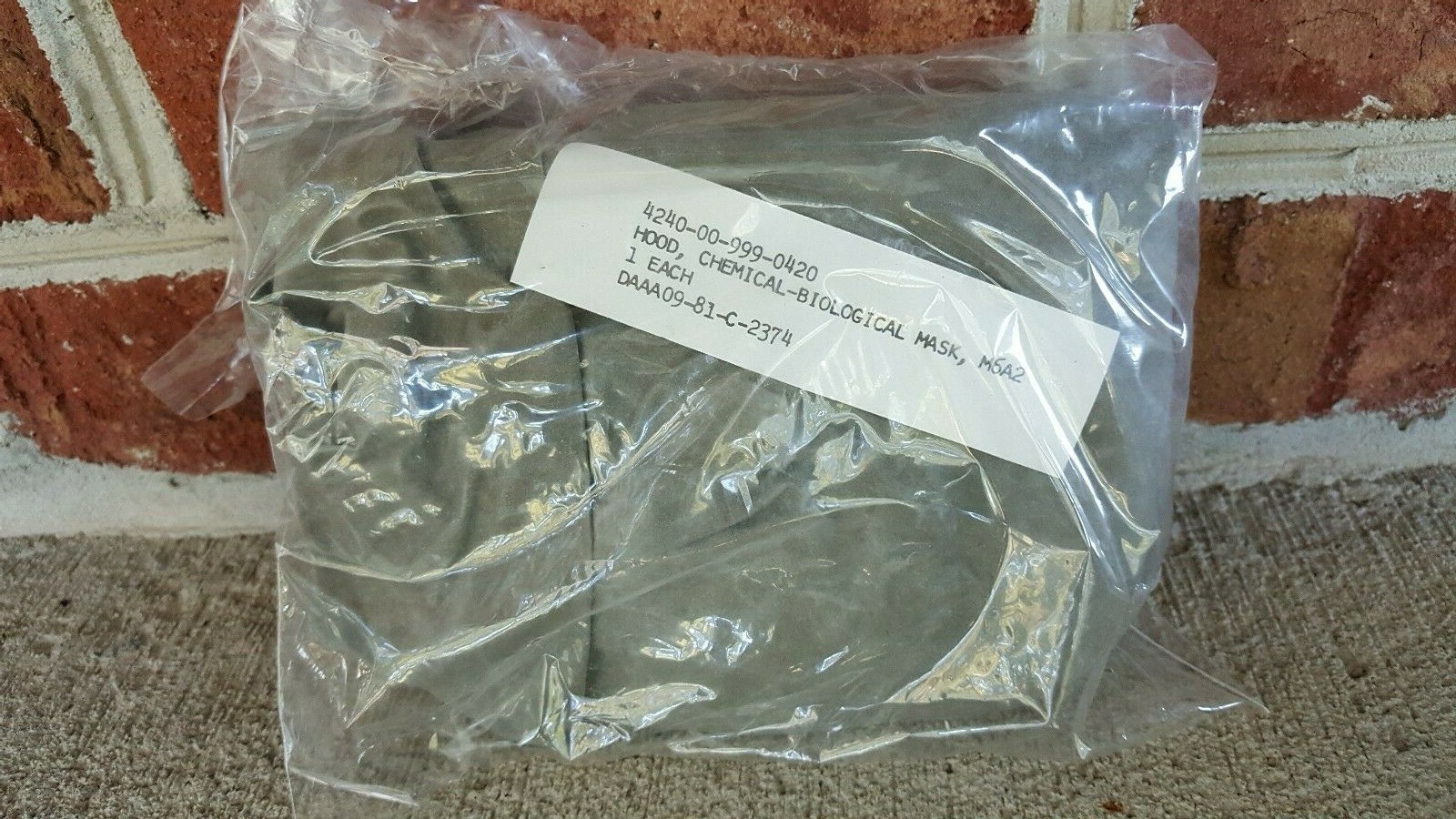 US M17 A1 A2 Gas Mask Hood M6A2 Chem Bio 1981 Dated New Old Stock US M17 A1 A2 Gas Mask Hood M6A2 Chem Bio 1981 Dated New Old Stock
