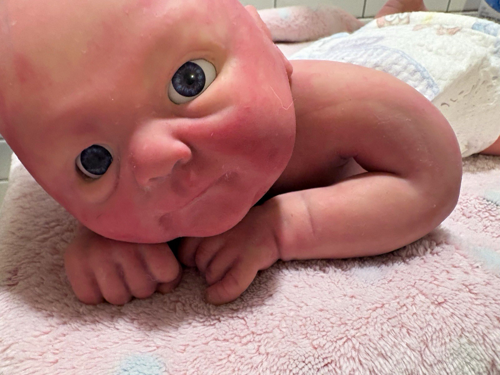 Reborn Doll Lifelike Feel Blue Eyes Full Body Silicone with custom paint. Reborn Doll Lifelike Feel Blue Eyes Full Body Silicone with custom paint.