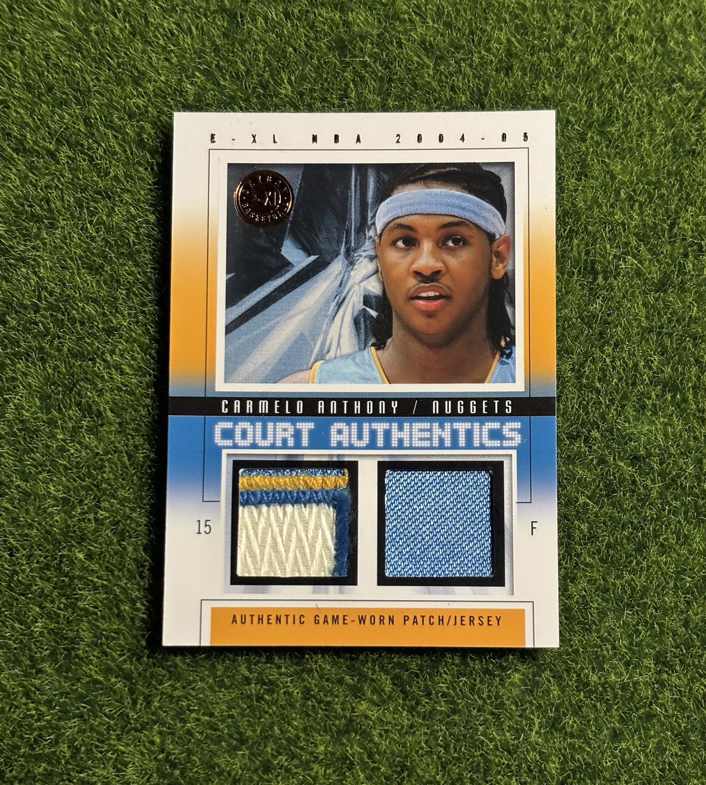 2004-05 Fleer E-XL Carmelo Anthony Court Authentics Dual Game Worn Patch #’d /35 2004-05 Fleer E-XL Carmelo Anthony Court Authentics Dual Game Worn Patch #’d /35
