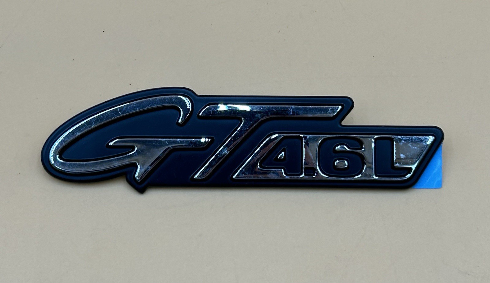 NOS 1996 1997 1997 FORD MUSTANG GT 4.6L FRONT FENDER EMBLEM NEW. NOS 1996 1997 1997 FORD MUSTANG GT 4.6L FRONT FENDER EMBLEM NEW.