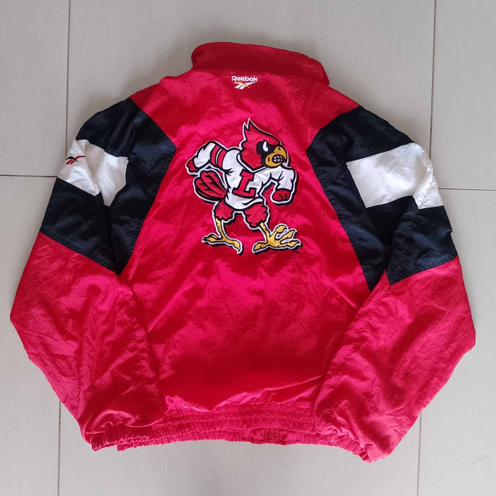 Vintage 1990s Reebok Louisville Cardinals NCAA Nylon Windbreaker Jacket Size M