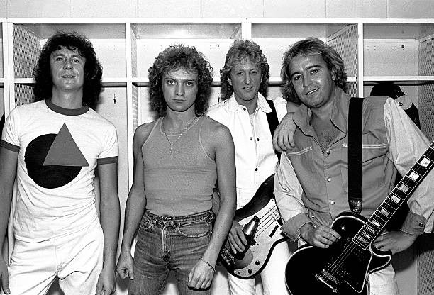 American-based rock band Foreigner as they pose backsatge November- Old Photo