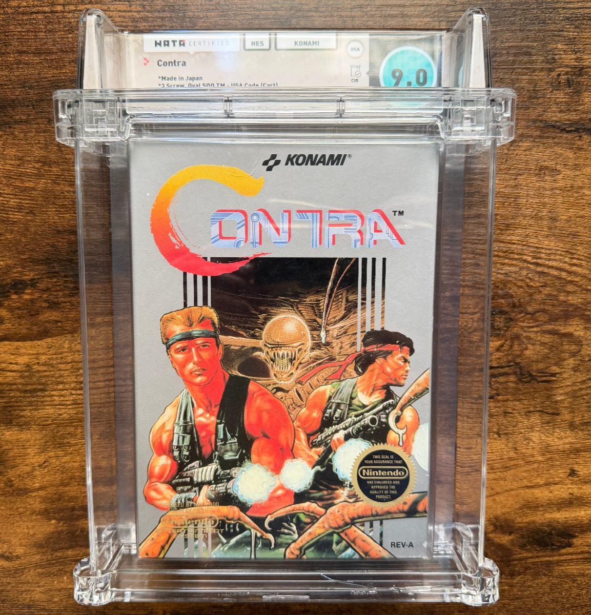 WATA 9.0 circle seal Contra complete in box nintendo nes game PSA 9 MINT