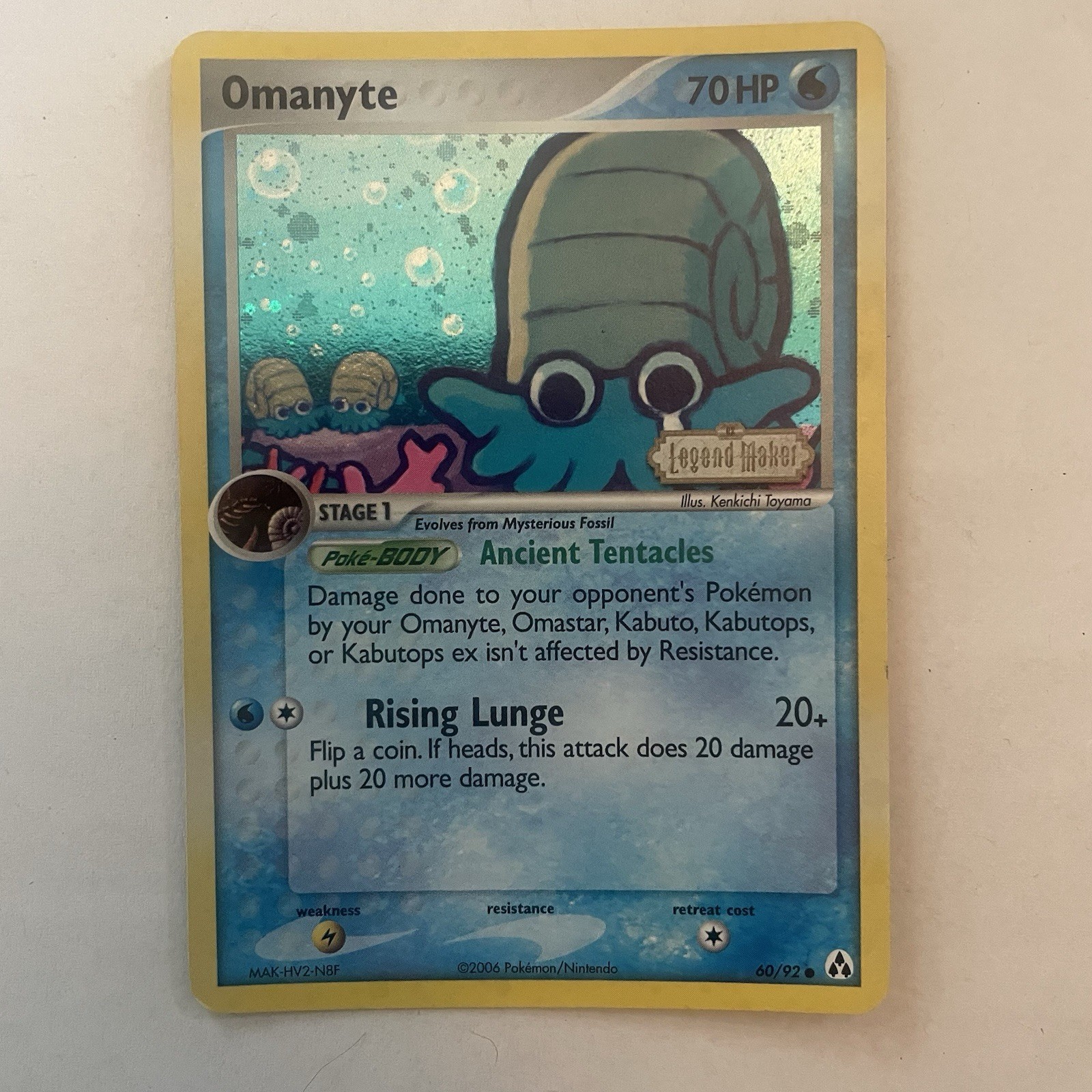 Pokémon TGC Omanyte 60/92 Stamped Legend Maker Holo Swirl Stage 1 Pokémon TGC Omanyte 60/92 Stamped Legend Maker Holo Swirl Stage 1