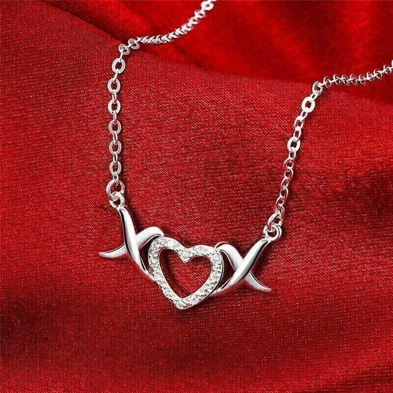 Round Cut Simulated Diamond In 14k White Gold Plated Stunning Heart & X Pendant