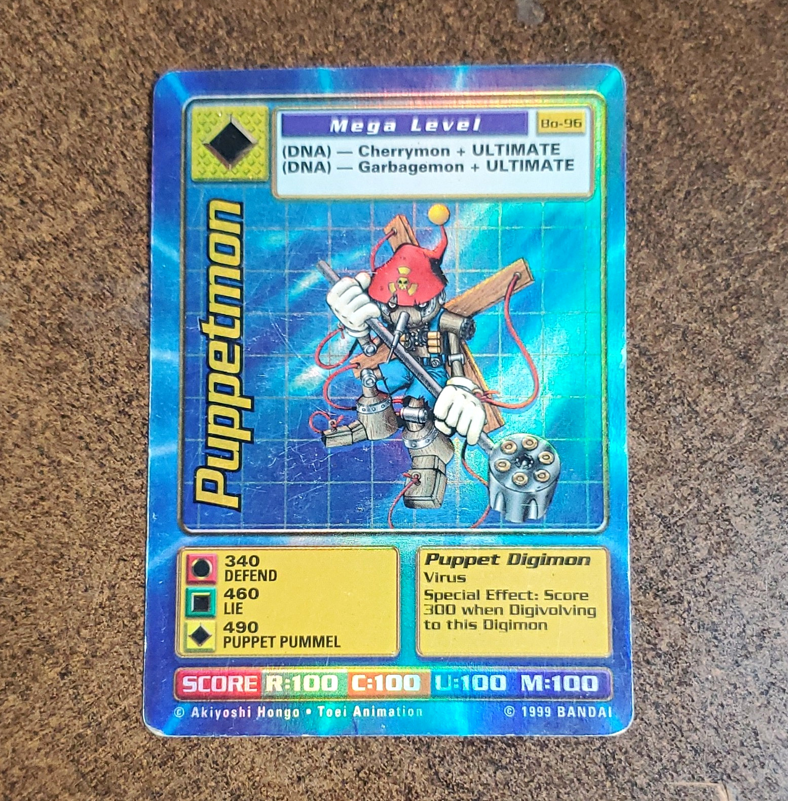 Bandai 1999 Digimon Monsters Puppetmon BO-96 Holographic ENG Trading Card