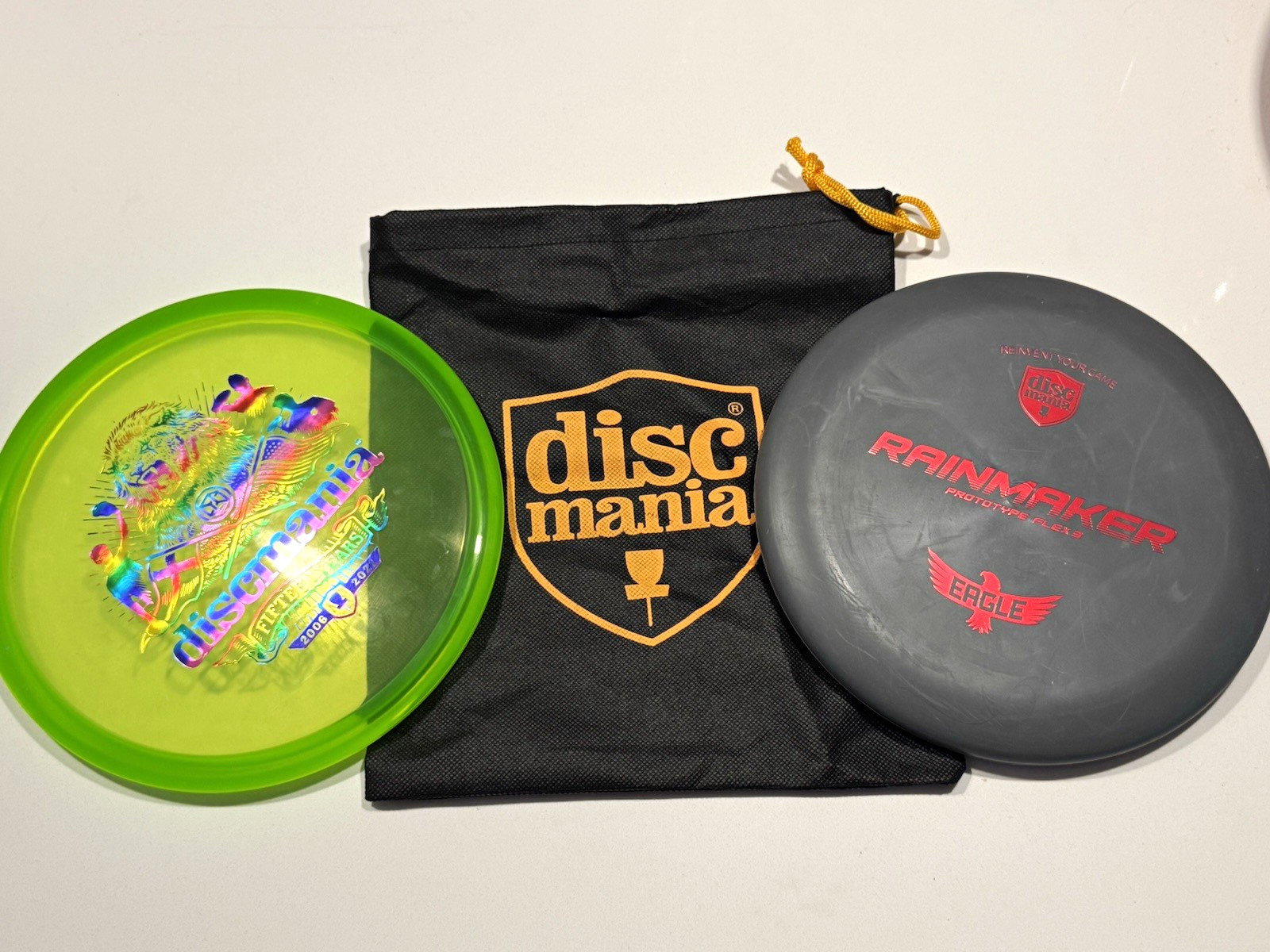 Discmania Rainmaker Prototype Disc + Fifteen Years 2006-2021 Disc w/ Bag Discmania Rainmaker Prototype Disc + Fifteen Years 2006-2021 Disc w/ Bag