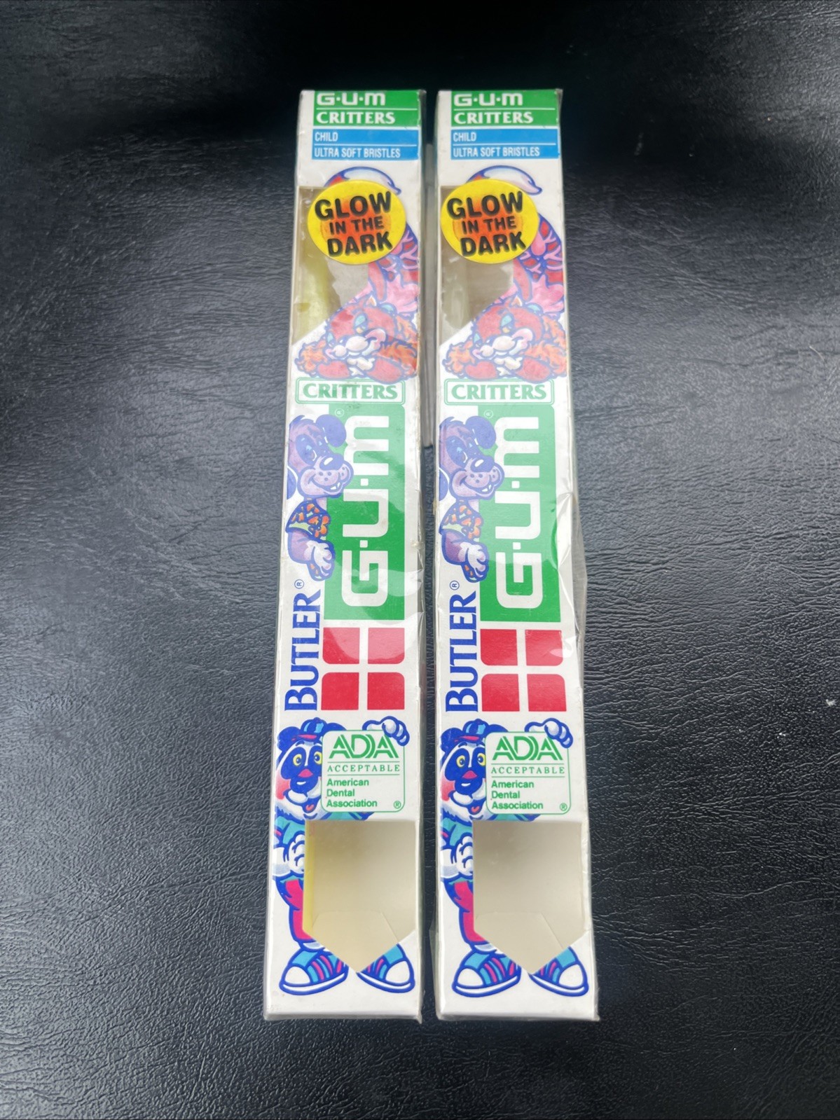 Butler GUM Critters Child Ultra Soft Toothbrushes Glow In Dark USA Lot of 2 VTG Butler GUM Critters Child Ultra Soft Toothbrushes Glow In Dark USA Lot of 2 VTG