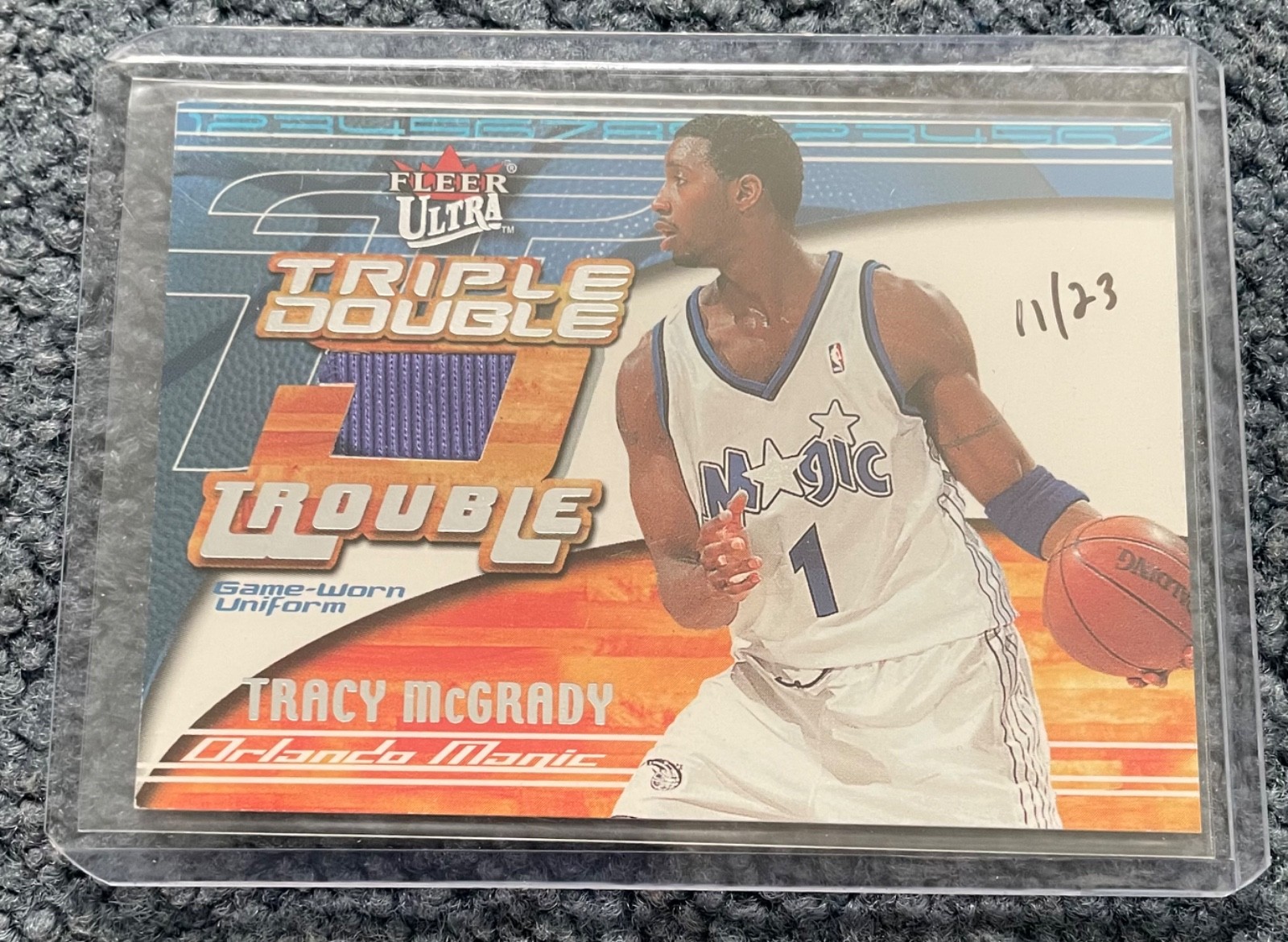 2004-05 Skybox Premium Buyback Tracy McGrady 2001-02 Fleer Ultra Jersey 11/23
