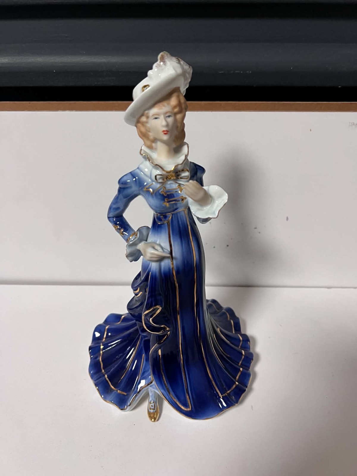 Vintage Porcelain Figurine – Elegant Lady in Cobalt Blue & Gold Dress