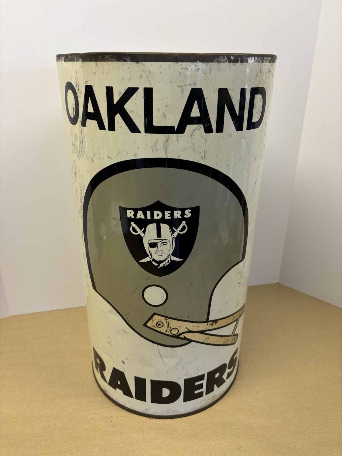 Vintage 1970s Oakland Raiders 1-Bar Football Helmet Double Sided Metal Trash Can Vintage 1970s Oakland Raiders 1-Bar Football Helmet Double Sided Metal Trash Can