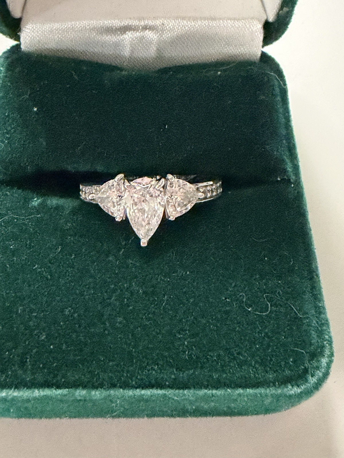 14k White Gold CZ Ring Pear Shape With 2 Trillions And Small Rd Stones On Sides 14k White Gold CZ Ring Pear Shape With 2 Trillions And Small Rd Stones On Sides