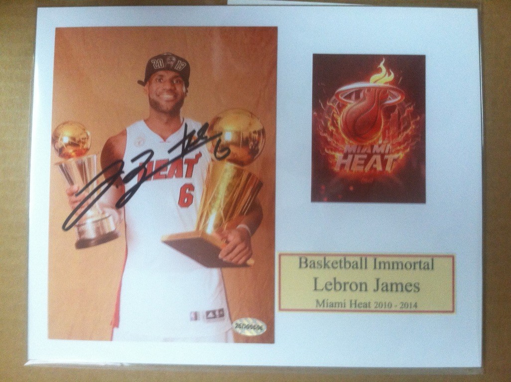 Signed LeBron James 5x7 color photo matted to 8x10 w/coa Signed LeBron James 5x7 color photo matted to 8x10 w/coa