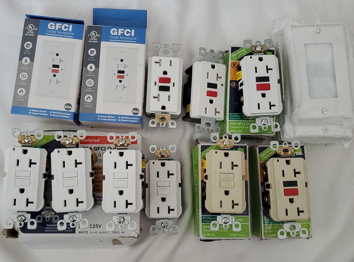Leviton 7 M42-GFNT2-4W 20V GFCI Outlet Plus 4 More with plates. Leviton 7 M42-GFNT2-4W 20V GFCI Outlet Plus 4 More with plates.