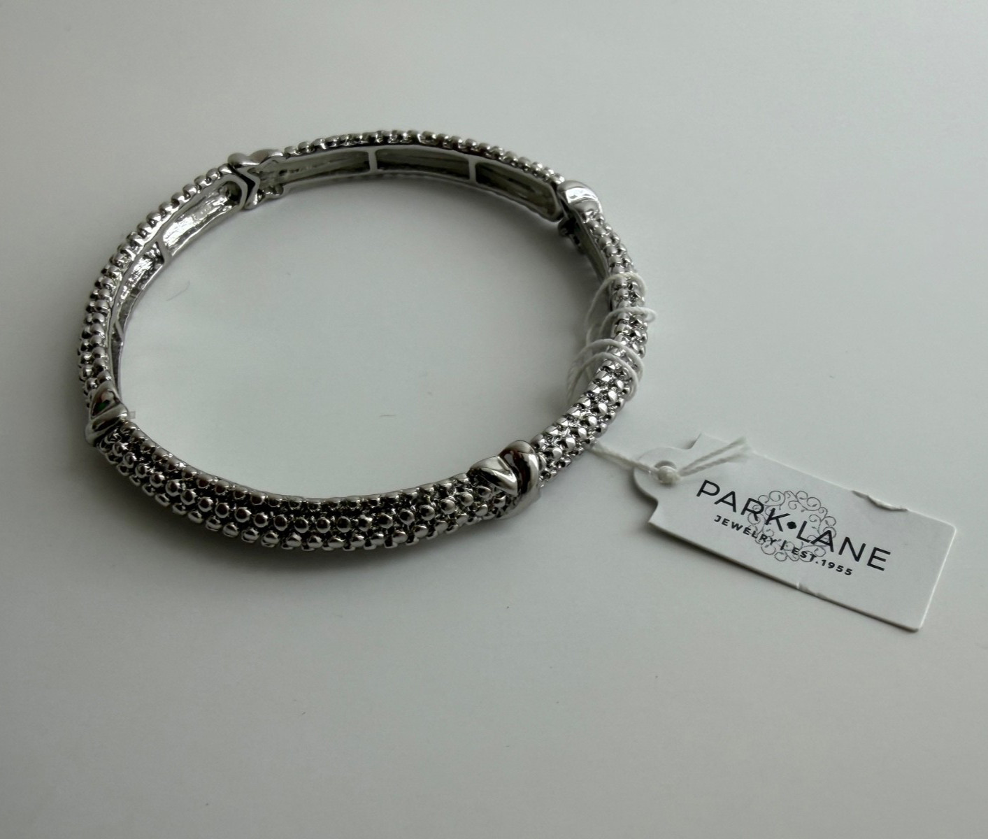 Park Lane Jewelry ~ RICA ~ Silver Tone Bangle Bracelet ~ Stretch To Fit ~ NWT Park Lane Jewelry ~ RICA ~ Silver Tone Bangle Bracelet ~ Stretch To Fit ~ NWT