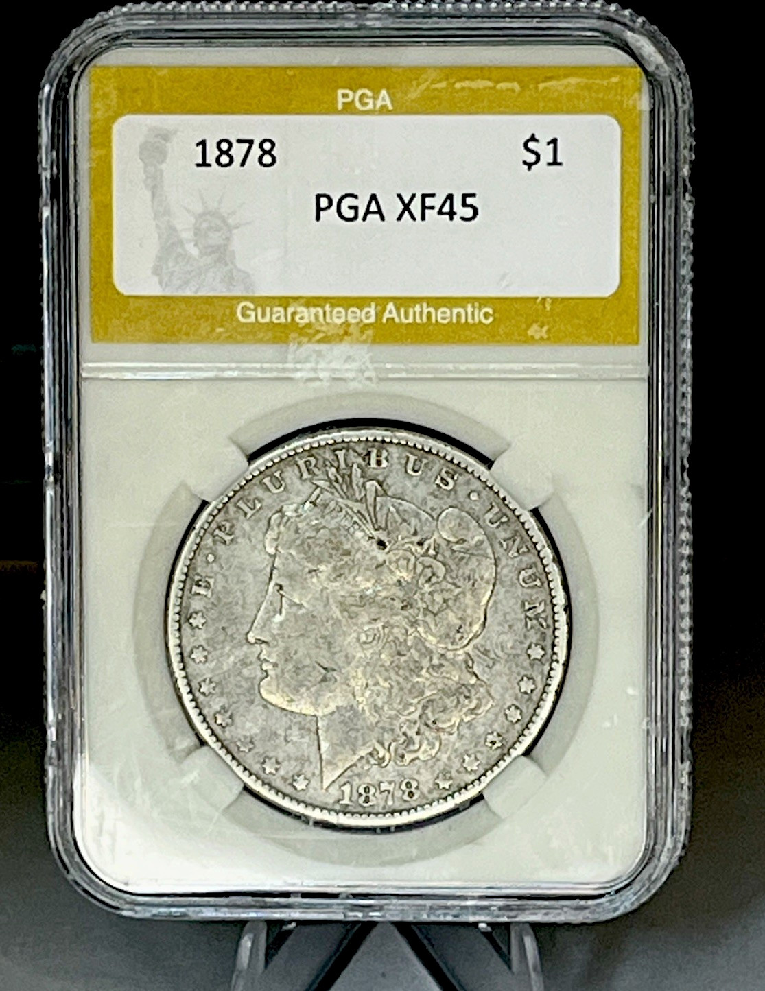 1878 Morgan Silver Dollar $1 0.900 Silver Philadelphia Business Strike PGA XF45 1878 Morgan Silver Dollar $1 0.900 Silver Philadelphia Business Strike PGA XF45