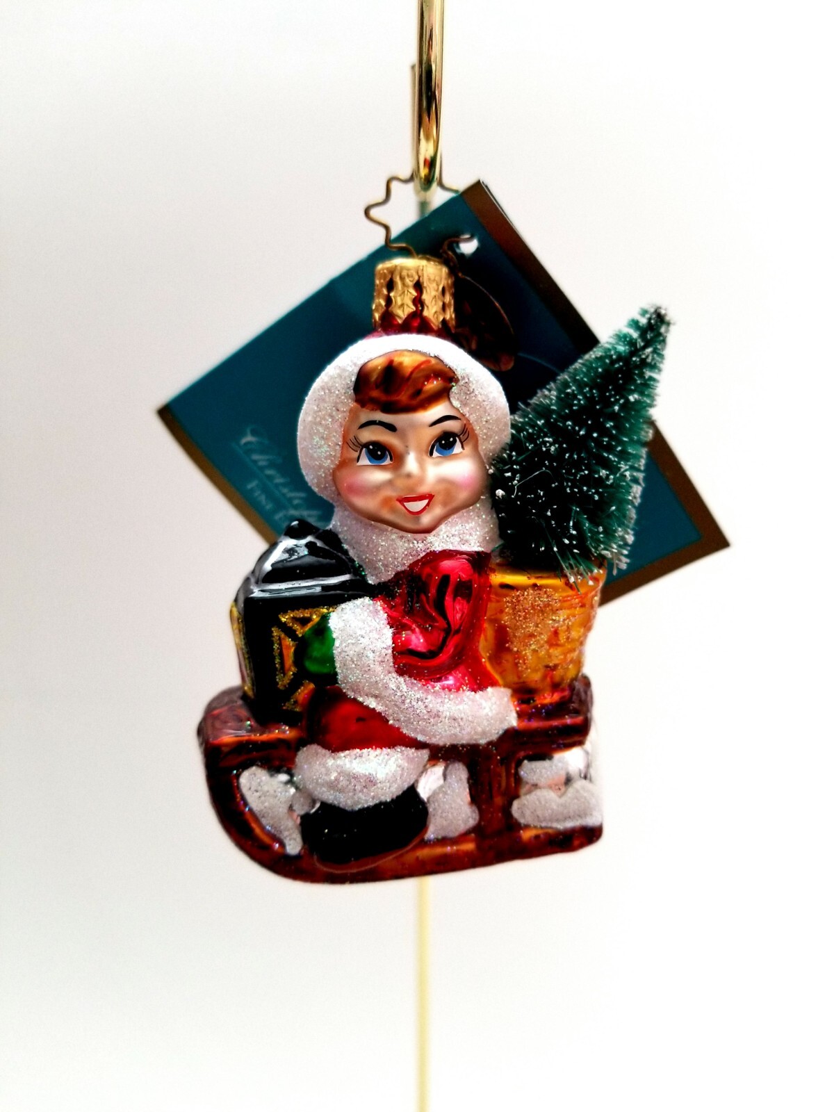 Christopher Radko - Homeward Bound Gem #1012509 Boy On Sled With Pine Tree 