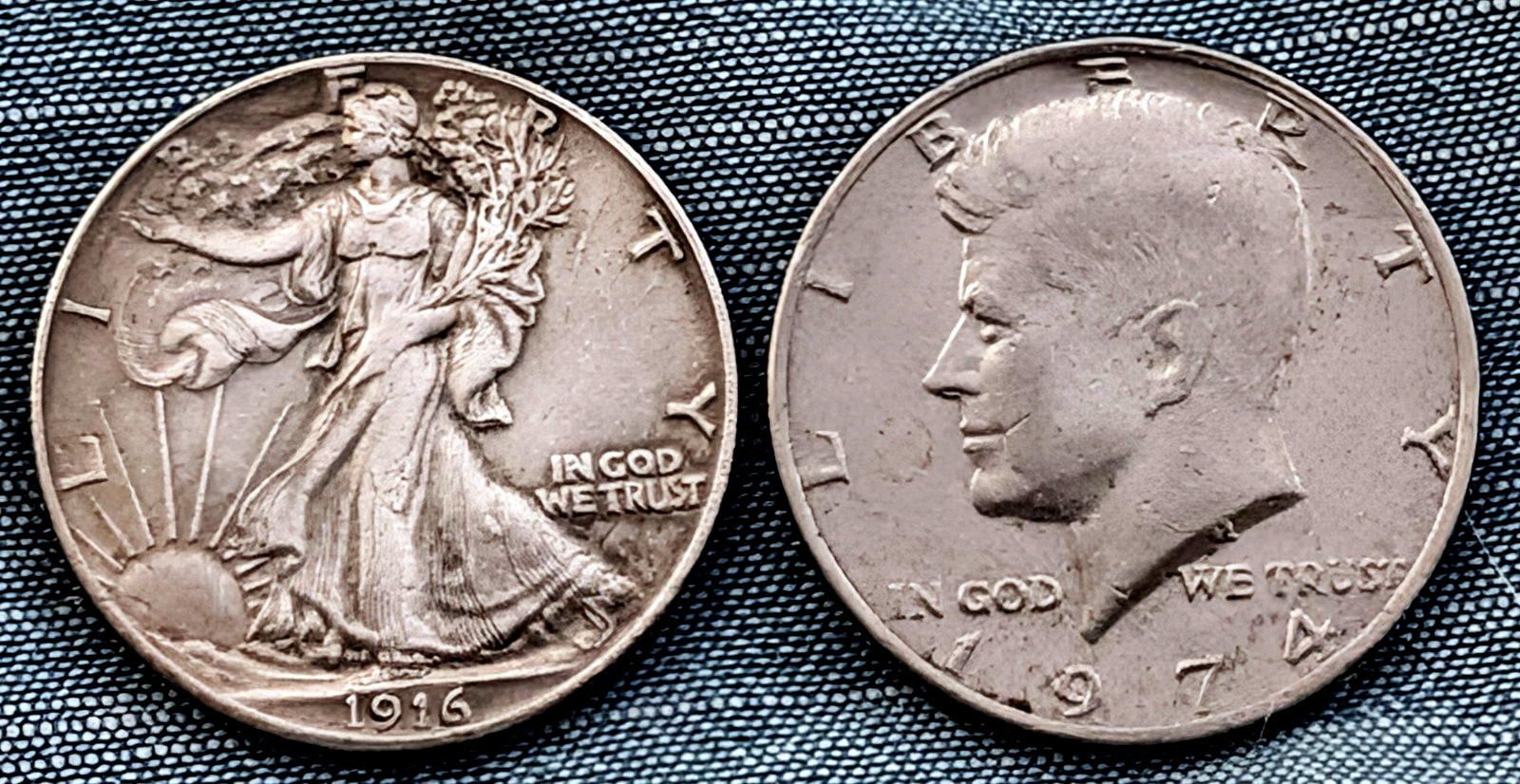 PRE-OWNED Walking Liberty Silver-Plated Half Dollar next to Kennedy Half Dollar