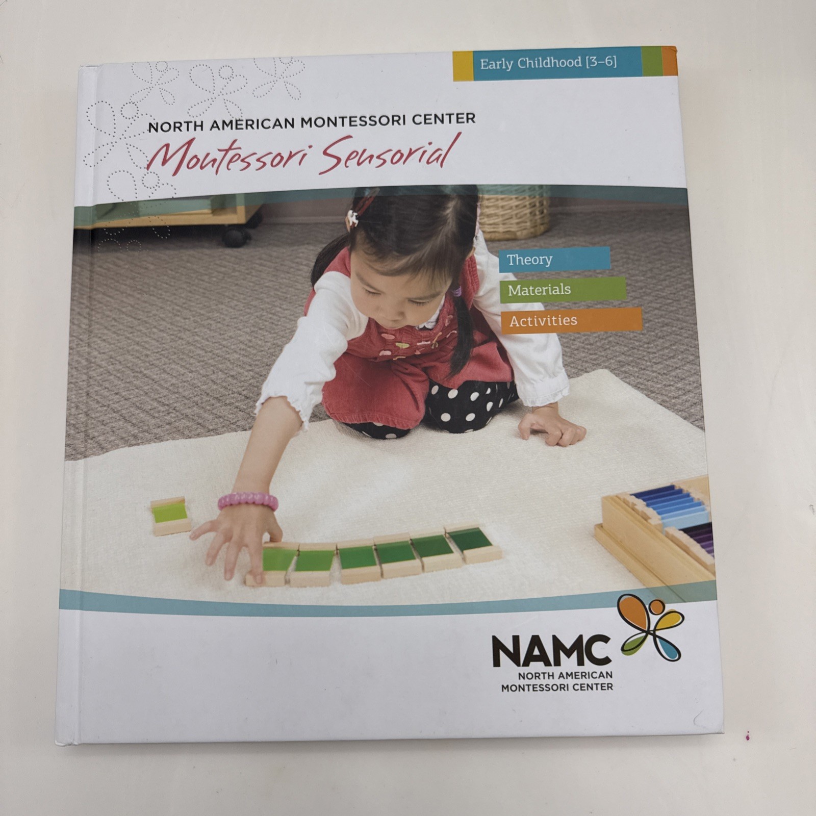 Montessori Sensorial Childhood 3-6 NAMC Hardcover Book