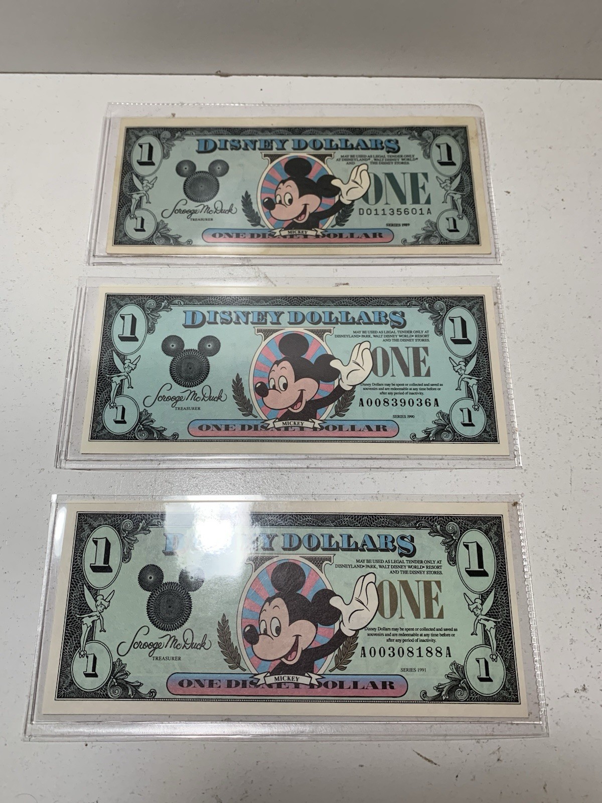 Lot of Disney Dollars, 1989 DA, 1990 AA, 1991 AA, Mickey Mouse Lot of Disney Dollars, 1989 DA, 1990 AA, 1991 AA, Mickey Mouse