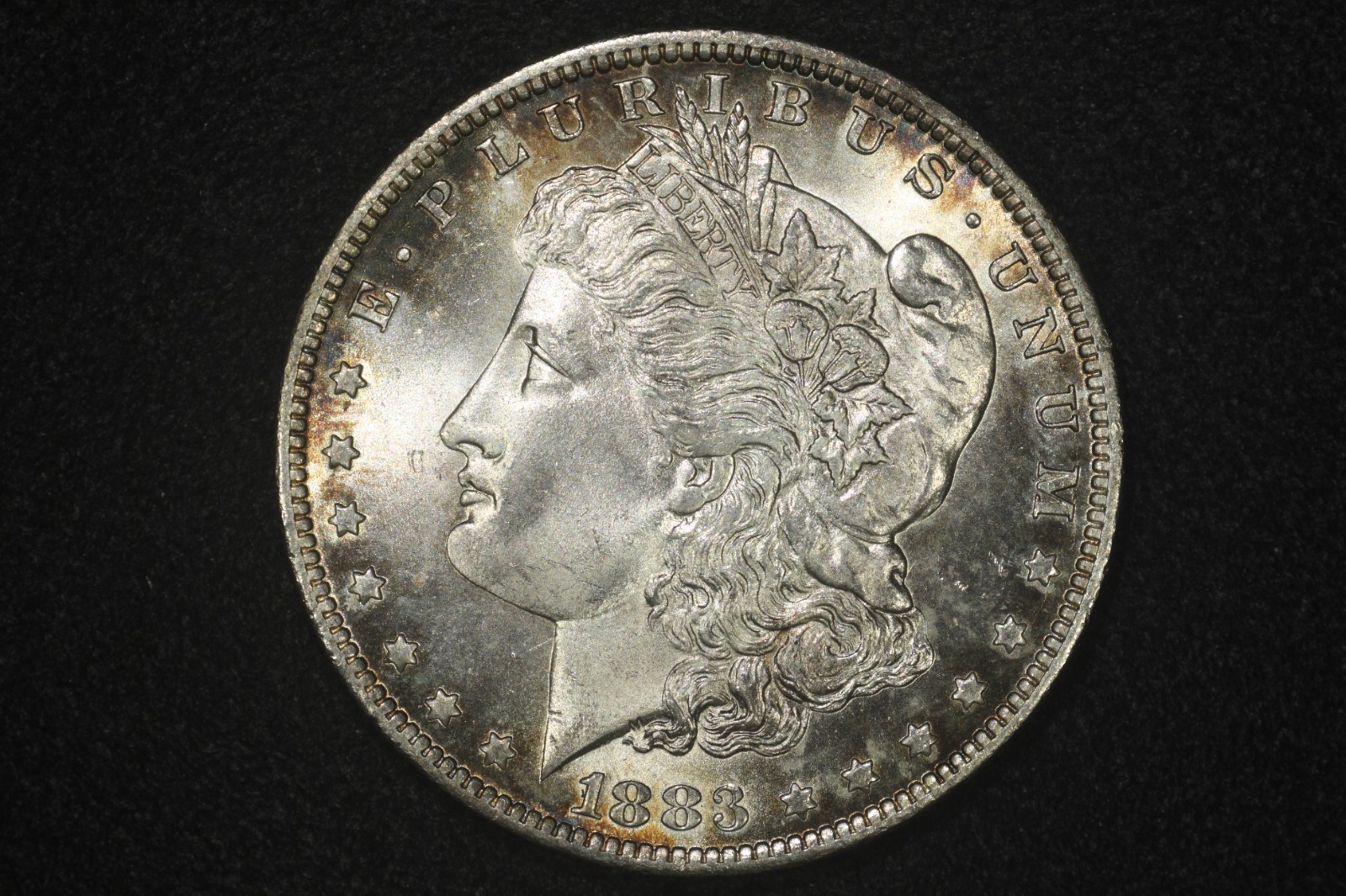 1883-O Morgan Dollar, Near Gem/Gem Toned Unc.