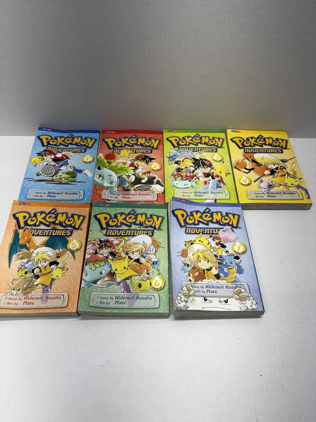 Pokemon adventures volumes 1-7  NICE USED