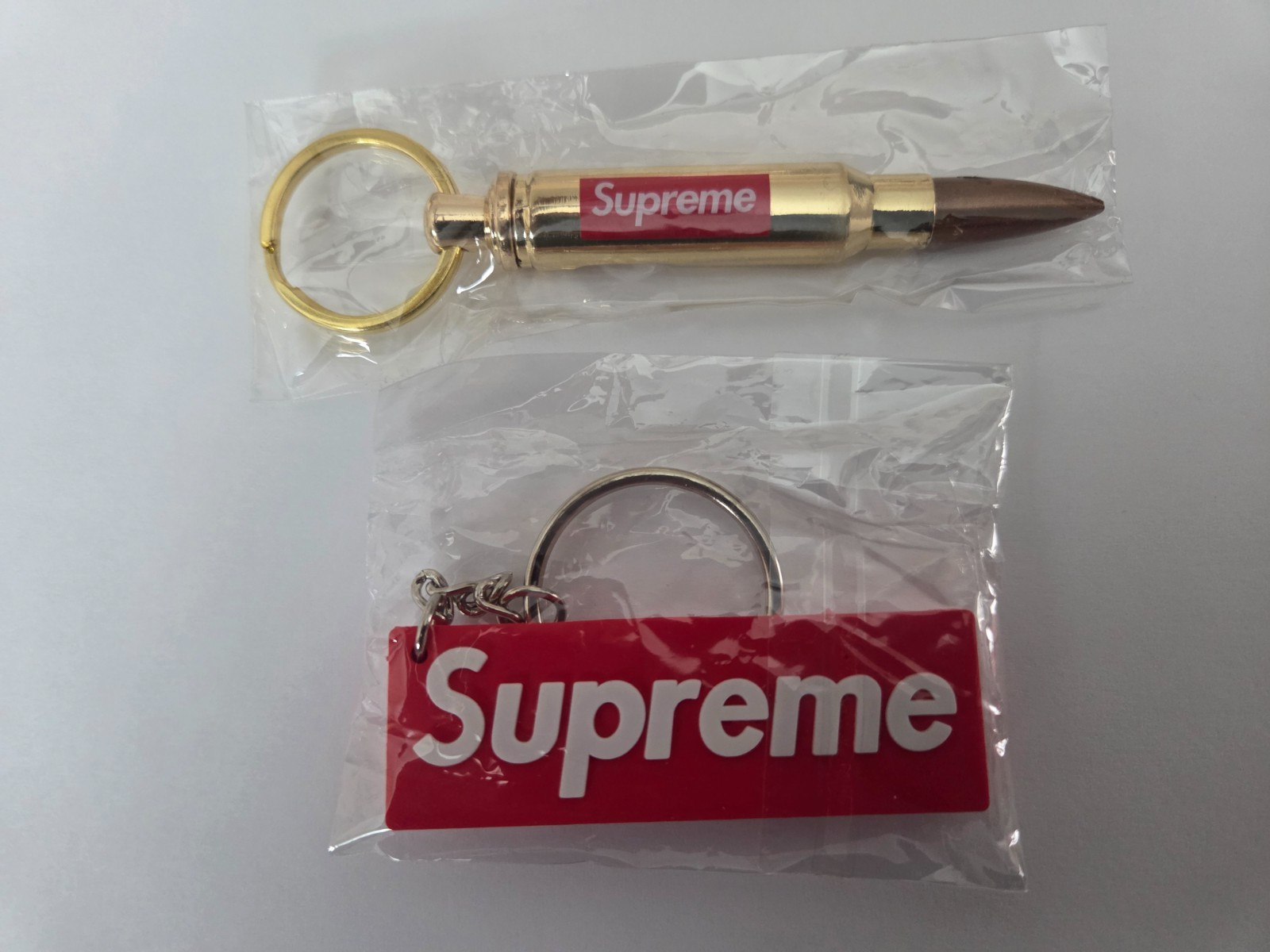 2pcs Supreme: 1 Keychain Bullet Bottle Opener and  1 3D Box Logo