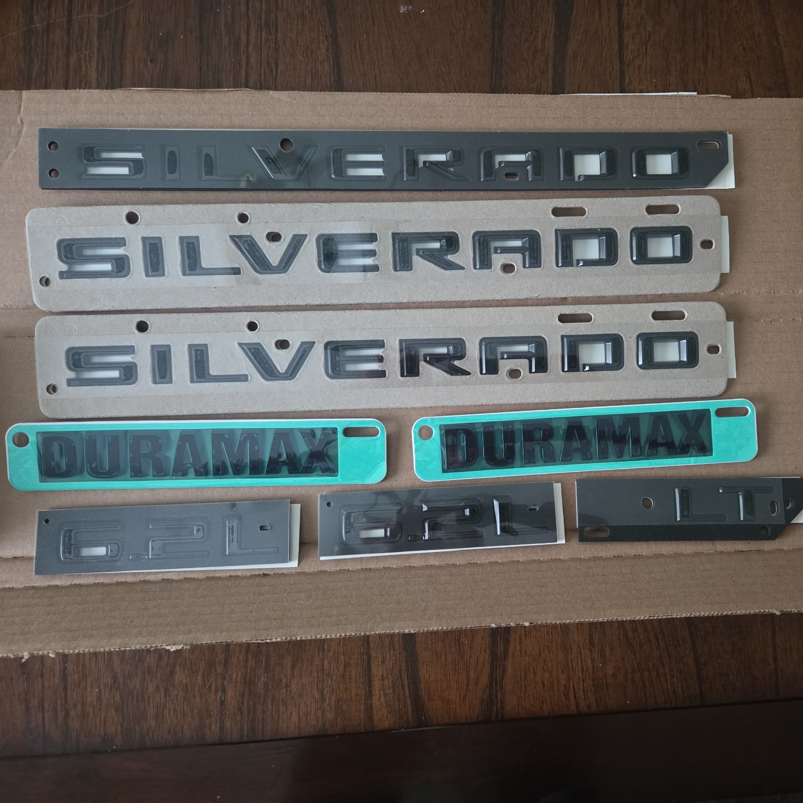 Genuine GM Chevrolet Silverado LT Duramax Black Emblem Kit 86539778 Brand New Genuine GM Chevrolet Silverado LT Duramax Black Emblem Kit 86539778 Brand New