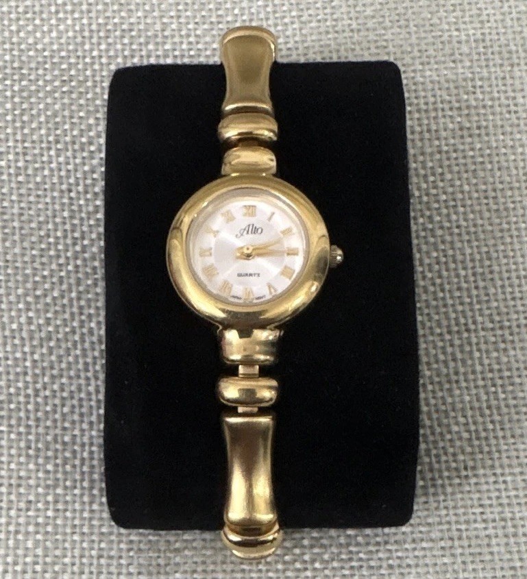Reloj Alto tipo brazalete para Mujer de Cuarzo en Tono dorado y Esfera blanca . Reloj Alto tipo brazalete para Mujer de Cuarzo en Tono dorado y Esfera blanca .