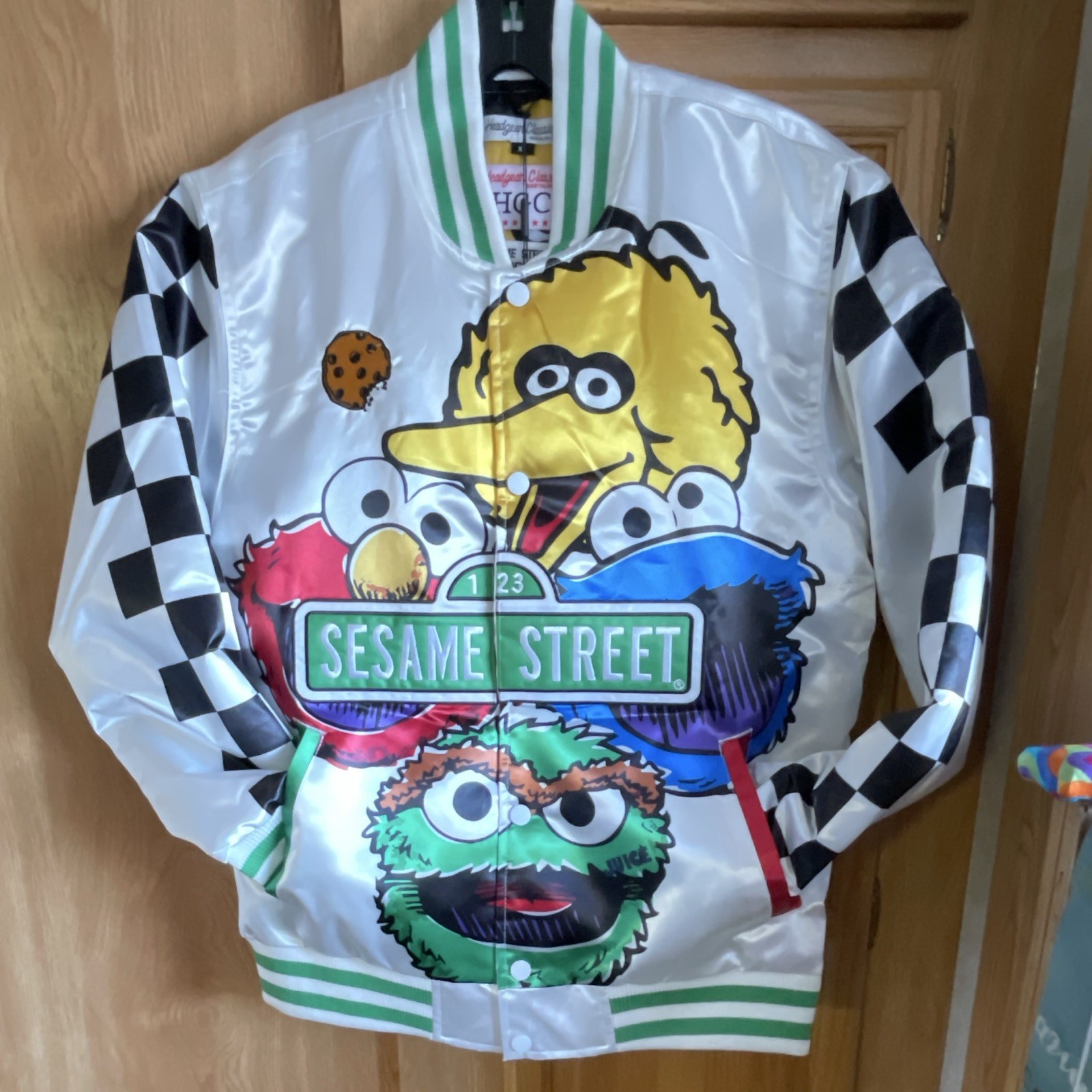 Headgear Classics Sesame Street Graphic Print Bomber Jacket White/Green Youth XL Headgear Classics Sesame Street Graphic Print Bomber Jacket White/Green Youth XL