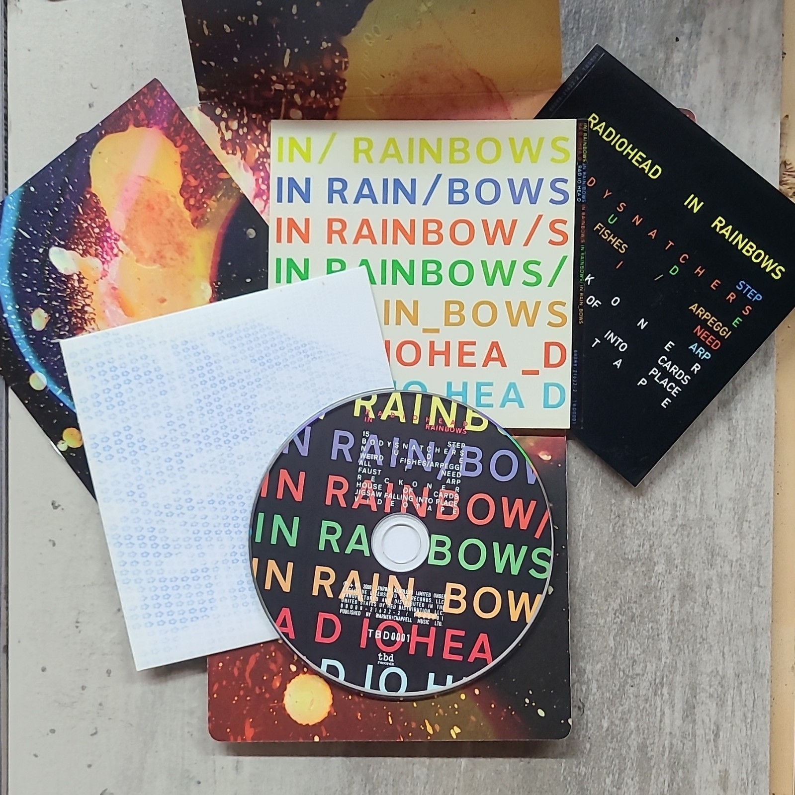 Radiohead In Rainbows CD, 2008 tbd records, Cardboard Sleeve PLUS Stickers 0001 Radiohead In Rainbows CD, 2008 tbd records, Cardboard Sleeve PLUS Stickers 0001