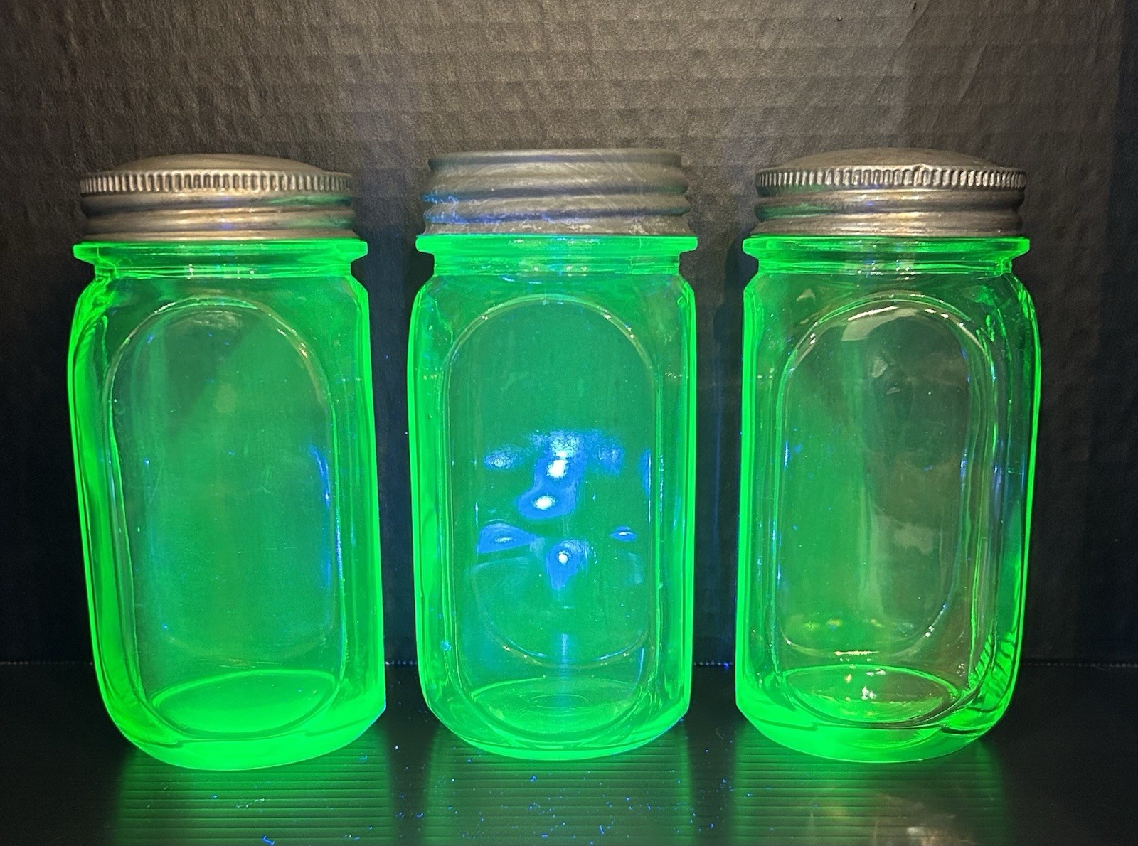 Vtg AH Green Uranium Glass Smooth Side Panel 6” Jars w/Screw-On Lids (set of 3) Vtg AH Green Uranium Glass Smooth Side Panel 6” Jars w/Screw-On Lids (set of 3)